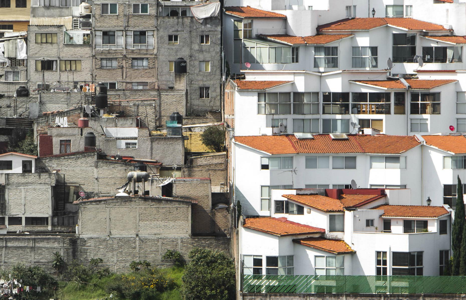 Mexico is the fourth most unequal country on the planet according to income, according to the latest OECD data. The country is no stranger to poverty, with more than 40% of Mexicans classified as poor. This image from Mexico City shows how closely the concrete homes of the city's poor sit next to the painted homes and tiled roofs of the more affluent.