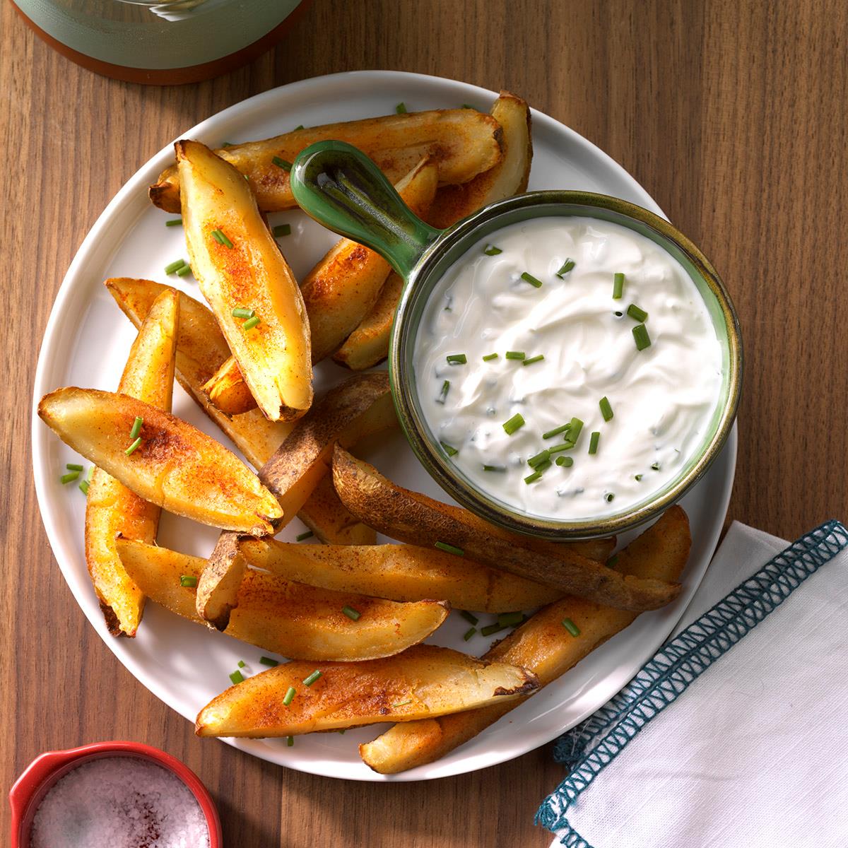 For a simple hot snack that really hits the spot on a cool fall evening, put together a plate of these crisp potato skins. —Andrea Holcomb, Torrington, Connecticut <a href="https://www.tasteofhome.com/recipes/savory-potato-skins/">Get Recipe</a>