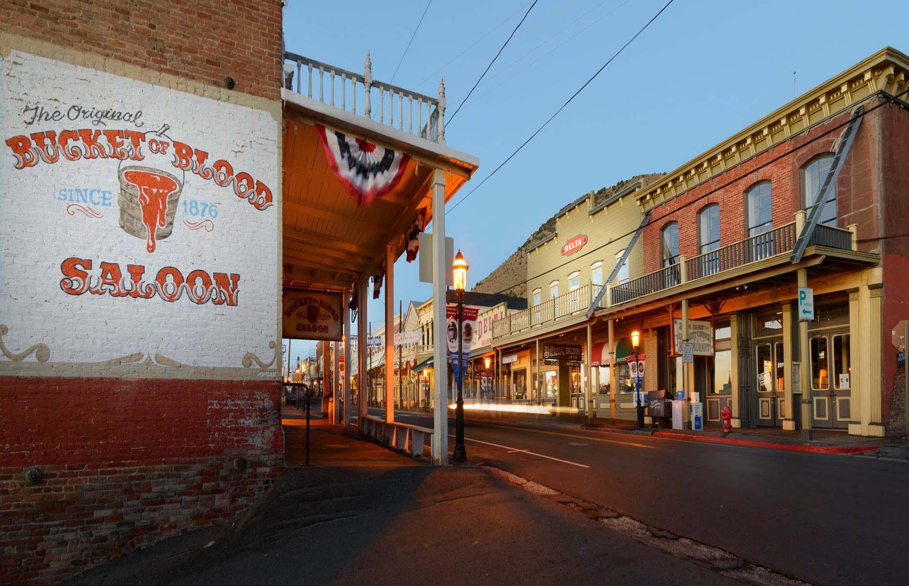 Slide 44 of 46: Virginia City was a boomtown which sprang into existence in 1859 after the discovery of a significant vein of silver in the Nevada Desert. In its peak in the mid-1870s it had around 25,000 residents. The mines' output dwindled after 1878 and the city itself declined as a result.