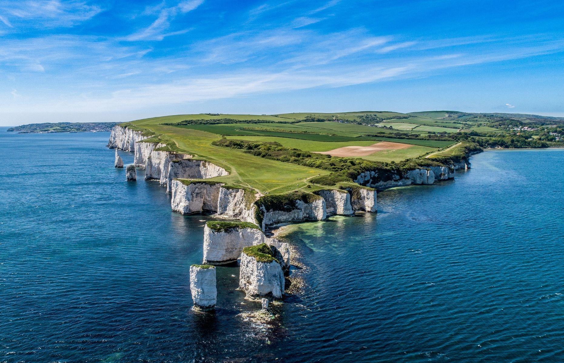 <p>England’s <a href="https://jurassiccoast.org/">Jurassic Coast</a> stretches 95 miles (153km) between Exmouth and Old Harrys Rocks. Spanning the counties of Devon and Dorset, this spectacular strip of shoreline is England's only natural UNESCO World Heritage Site. Dating back 185 million years, the region is renowned for its rock formations, pre-historic fossils and dramatic limestone cliffs. From <a href="https://www.theetchescollection.org/">The Etches Collection</a> – a museum of Jurassic marine life – to <a href="https://charmouth.org/charmouth_village/charmouth-fossil-hunting/">fossil hunting</a> on the beaches between Charmouth and Lyme Regis, this patch of England has it all.</p>