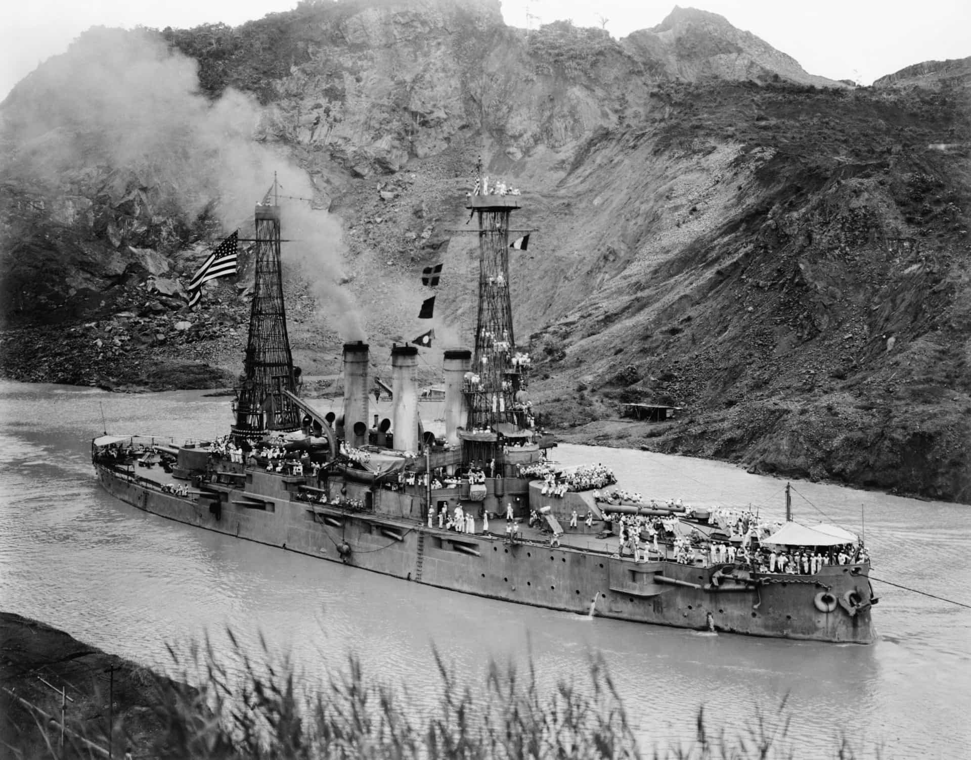 Pictured is the <em>USS Ohio</em> passing through the Panama Canal on July 16, 1915. The ship is passing the Cucaracha Slide in the the eight-mile-long (12.8-km) Culebra Cut.