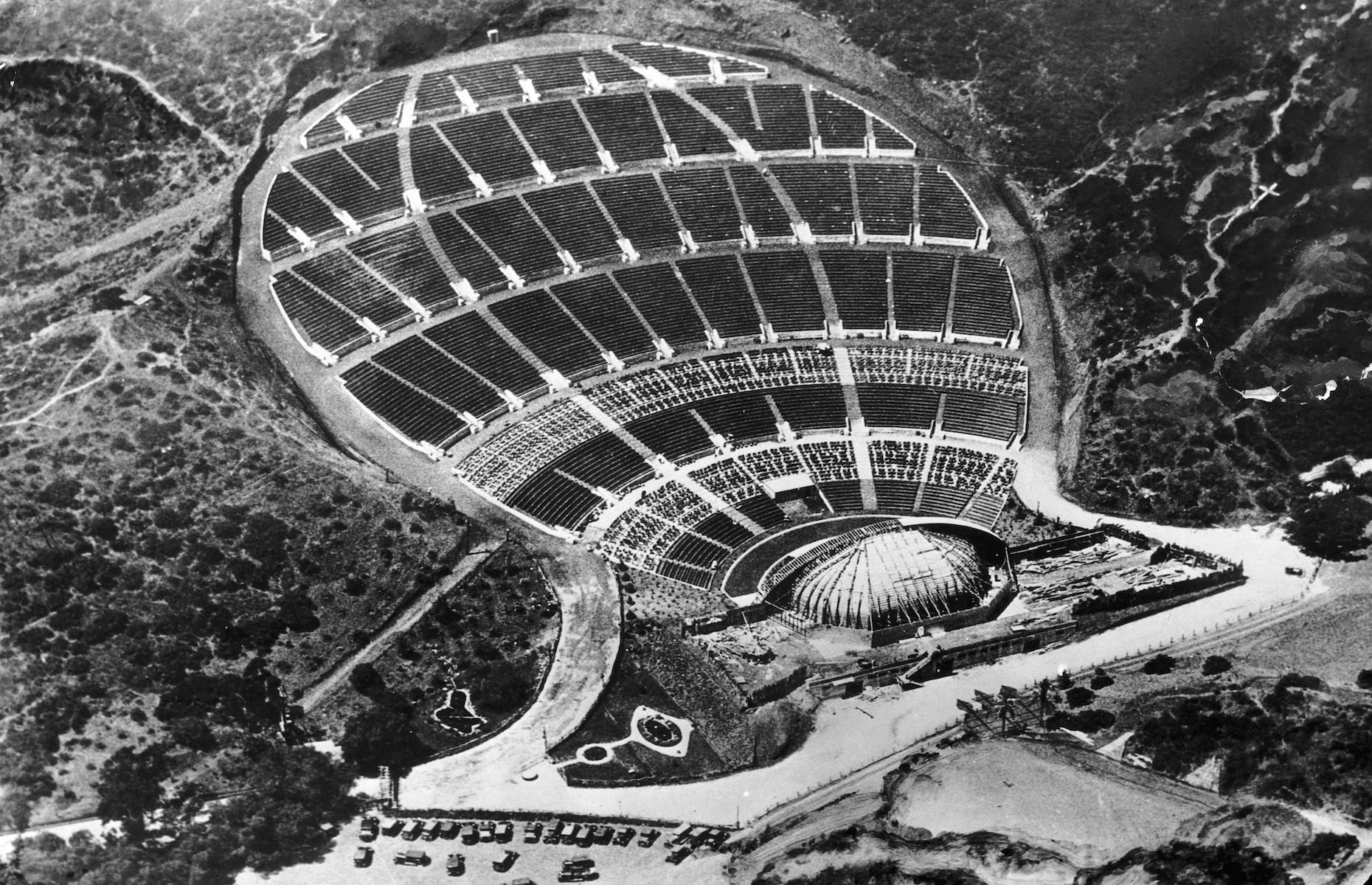 <p>This world-renowned amphitheater opened in the Hollywood Hills neighborhood in 1922. The first stage was a simple wooden platform with a canvas top and the audience were seated on wooden benches. An arched stage was built in 1926 with its distinctive shell shape first added in 1929. The 55-ton shell (pictured here in the 1930s) became an architectural icon. The 1930s saw jazz performances here for the first time and it went on to host the likes of Ella Fitzgerald, Billie Holliday and The Beatles.</p>