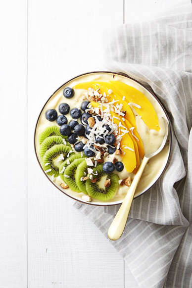 Slide 25 of 31: This bowl is begging to be Instagrammed and takes all of 10 seconds in the blender.Get the recipe for Tropical Smoothie Bowl » 