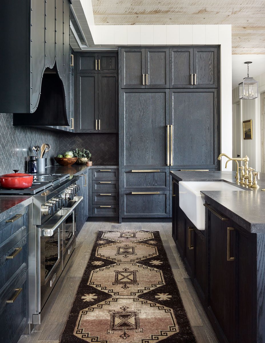 Though inspired by a Moroccan silhouette, the kitchen’s custom bronze hood is designed with straps and rivets that lend a Western sensibility.