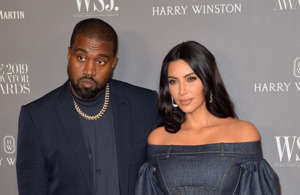 Kanye West, Kim Kardashian posing for a picture