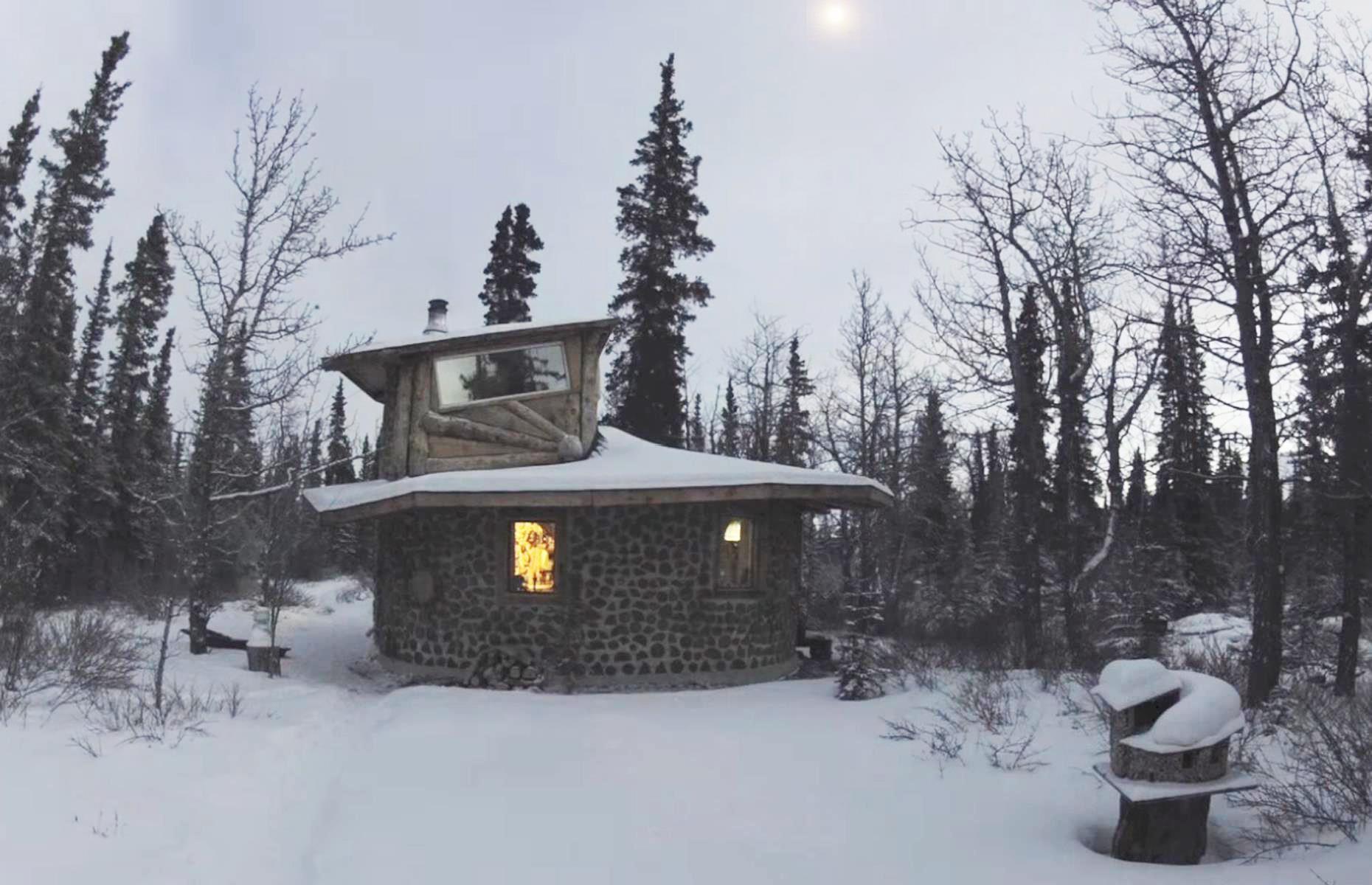 <p>This round little house in the <a href="https://www.loveproperty.com/gallerylist/70498/the-deep-freeze-homes-vs-the-snow">snowy wilderness</a> was built in Yukon Territory, Canada, by <a href="https://www.youtube.com/channel/UCIgKXE6qVQotojl6Z_5ia5g">Sally Wright</a>. She had dreamed about living in a rustic house in the wilderness for years. Sally made a <a href="https://www.youtube.com/watch?v=-YQ7kMyWeyw">short film</a> about the construction process to realizing those dreams.</p>