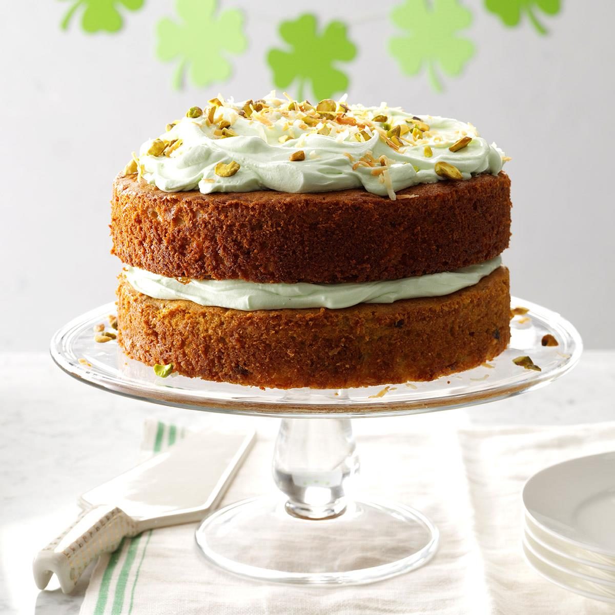 This coconut cake is good any time of the year, but the color is perfect for St. Patrick's Day. The secret is adding instant pistachio pudding mix into the cake mix and the frosting. —Dora May Meredith, Rockford, Illinois <a href="https://www.tasteofhome.com/recipes/pistachio-and-coconut-cake/">Get Recipe</a>