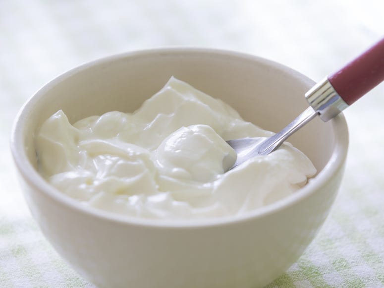 Greek yogurt can be used to make sauces or it can be eaten plain. Shutterstock