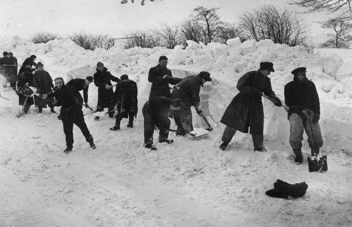 24 of 64 Photo in Gallery: Post-war Britain was belted with a bitterly cold winter in 1947, when record amounts of snow fell over a six-week period. Snowdrifts of up to 13&nbsp;feet (4m) were recorded and led to blocked roads and railways around the country, as well as stranded communities and livestock that was left to perish in snowbound fields. The armed forces were called upon to clear the snowdrifts. By March, the thawing snow caused rivers around the country to overflow, flooding homes and rendering roads inaccessible.