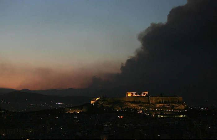 55 of 64 Photo in Gallery: Some of the worst wildfires in Greece ravaged parts of the parched country during the scorching summer of 2007. Southern Europe's intense heatwave, which saw Athens reach temperatures of&nbsp;113°F (45°C) in the shade, sparked forest fires that were then fanned by high winds. There were ferocious fires in the Peloponnese and on the fringes of the Greek capital, Athens.&nbsp;