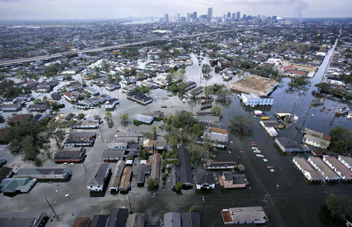 53 of 64 Photo in Gallery: On 29 August 2005, New Orleans was lashed by one of the biggest hurricanes the South had ever seen. It started as a tropical depression over the Bahamas but by the time it struck Louisiana, winds of more than 100 miles per hour (161km/h) pummeled the city, causing damage to property and catastrophic flooding. It led to at least 1,833 deaths and displaced more than 400,000 residents.