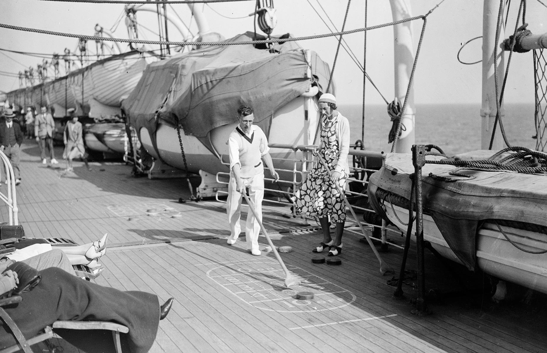 The 1930s unfolded in much the same way as the decades previous, as the golden age of cruising continued: think deck games, dinners and dances. The king of all cruise-ship hobbies was shuffleboard, a game that's still often played on modern-day liners. Here, a couple enjoy a game on a cruise to Gibraltar on Cunard's Aquitania in 1932.