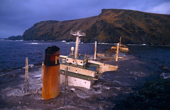 49 of 64 Photo in Gallery: Hurricane-force winds and stormy seas in the Shetland Isles sparked concerns of an ecological disaster, when the Braer oil tanker ran aground, spilling almost 85,000 tons of crude oil into the ocean. The tanker lost power in the ferocious storm and went on to hit rocks on the southern tip of Shetland on 5 January 1993. While thousands of birds perished and many marine animals were affected, in the end the bad weather helped limit the damage, by sweeping the oil out to sea.