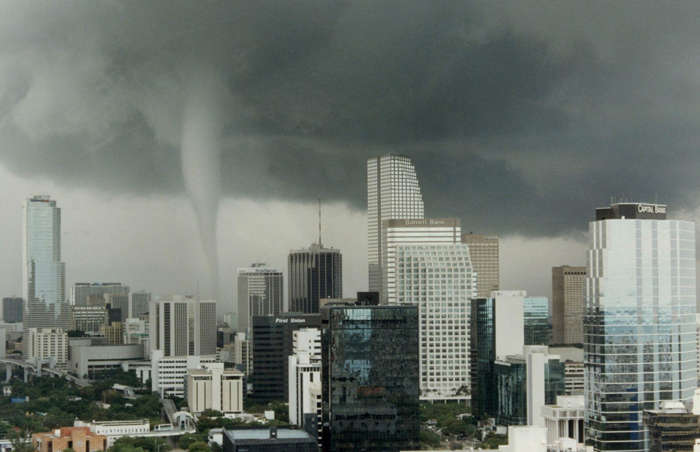 50 of 64 Photo in Gallery: The Great Miami Tornado, also known as the 1997 Miami Tornado, touched down in the city on 12 May. Registering F1 on the Fujita scale, the tornado is thought to have had wind speeds above 100 miles per hour (161km/h) and swept directly through the heart of downtown Miami. Despite causing significant damage and injuring dozens of people, the event is mostly remembered for the iconic photographs that were captured of the tornado ripping past the city's towering skyscrapers.