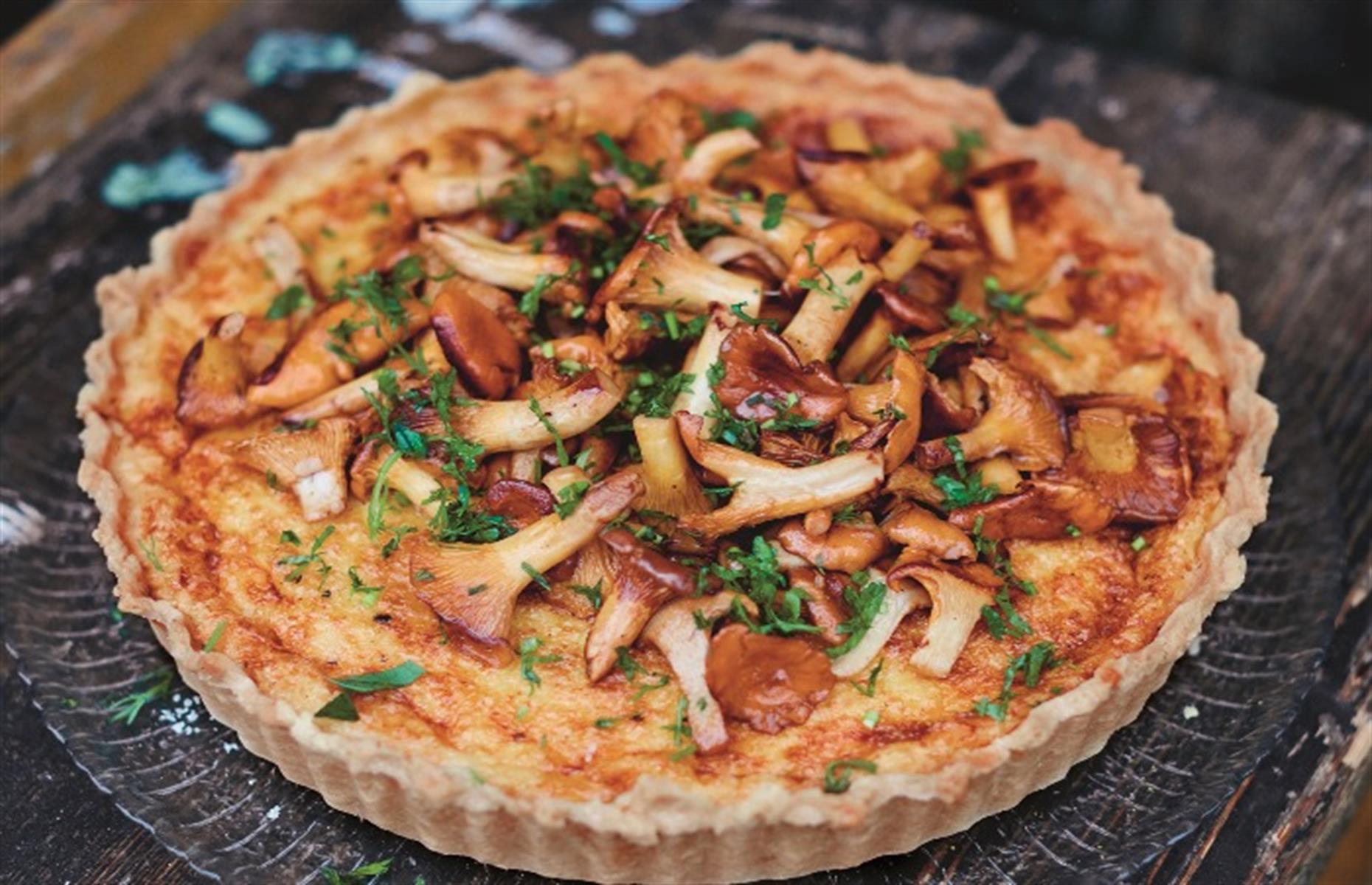 Slide 7 of 31: In Scandinavia, this pie is served at parties and for Christmas, but it's wonderful at any time of year. You can serve it cold, too, but just sauté then add the mushrooms before serving. The recipe uses chanterelle mushrooms, which you can replace with small button mushrooms. Definitely a dish for cheese-lovers everywhere.  Get the recipe for mushroom and cheese pie here