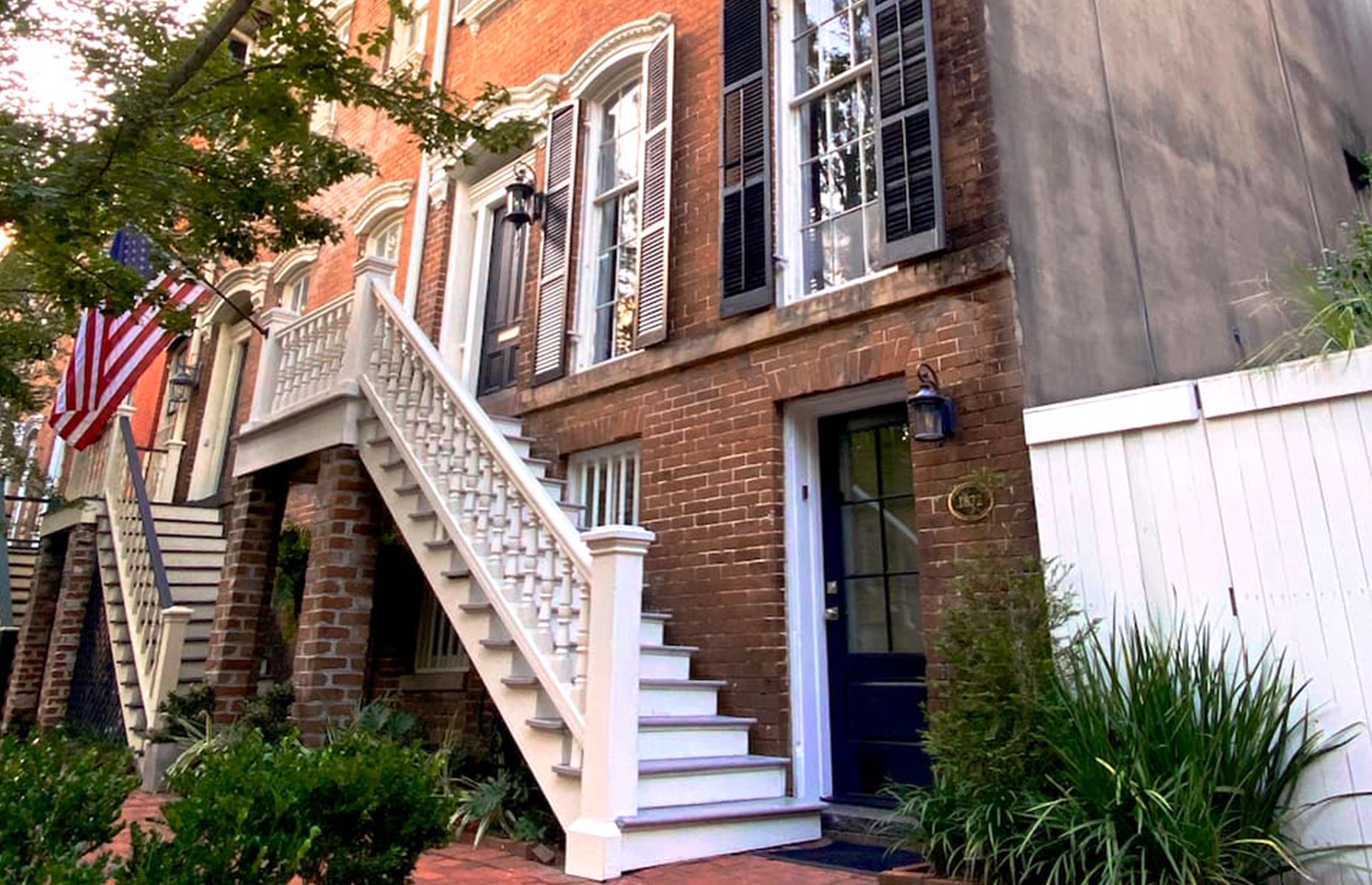 <p>It doesn't get much more Savannah than this. Many elegant townhouses line the city's bricked, Spanish-moss draped streets, and <a href="https://www.airbnb.co.uk/rooms/22412416?check_in=2020-12-14&check_out=2020-12-16&source_impression_id=p3_1605520605_DkW13pHnpULsR67U">this super chic apartment</a> is tucked into one of them. Dating to the 1870s, it's right in the Historic District, a stone's thrown from the famous Forsyth Park, and boasts an idyllic courtyard with a firepit, plus bare brick walls and fireplaces. It's possible to stay here for $88 per night. </p>
