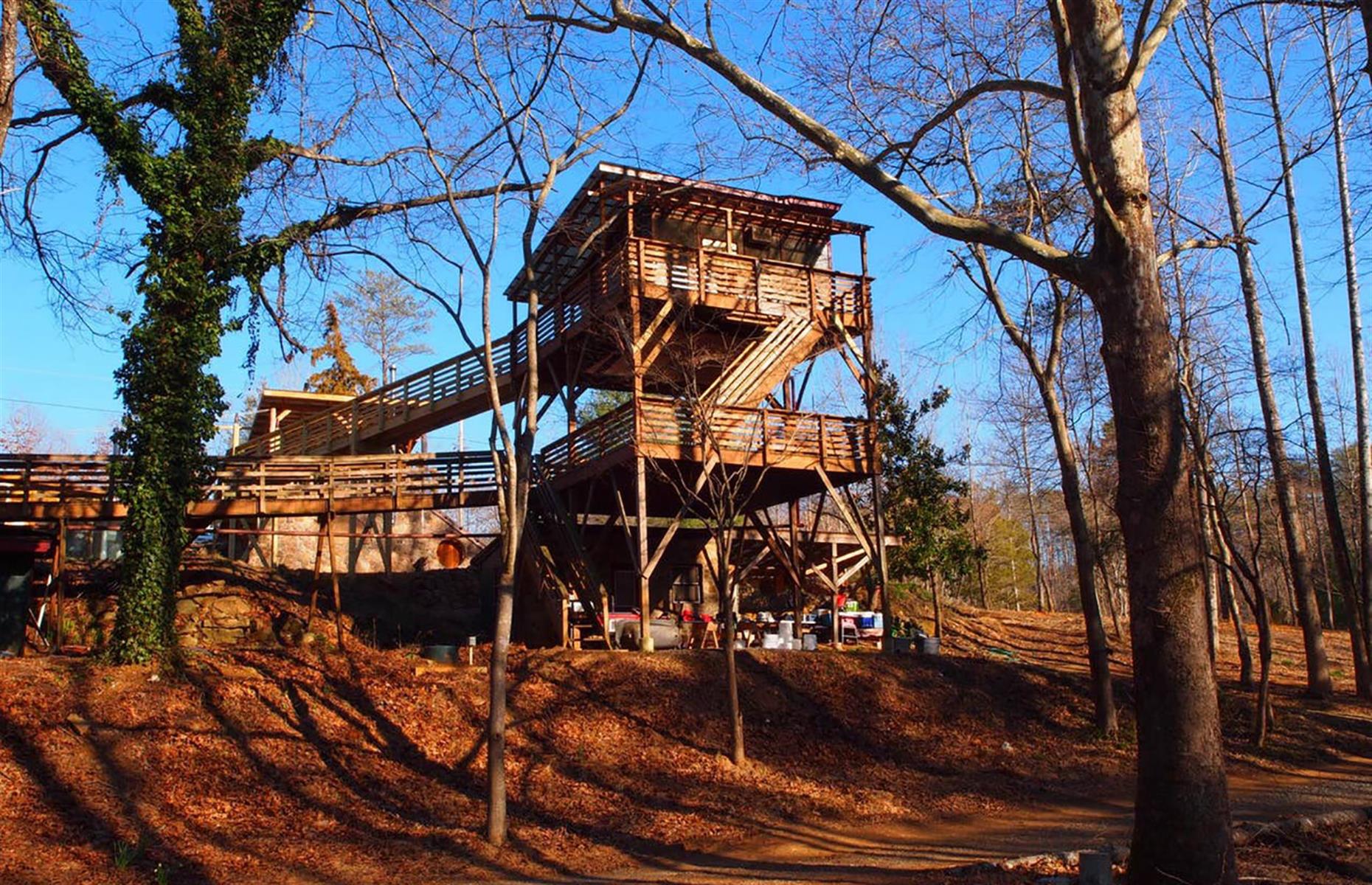 <p>Unique is an understatement when it comes to <a href="https://www.airbnb.co.uk/rooms/886469">this $125-a-night treehouse</a>. There are catwalks suspended in the air and several private and shared rooms located within the treehouse. To enhance your stay in the wild, the property owners also offer to arrange yoga classes, a massage therapist and a tour of the nearby Mulberry organic farm – check with the hosts for current availability.</p>