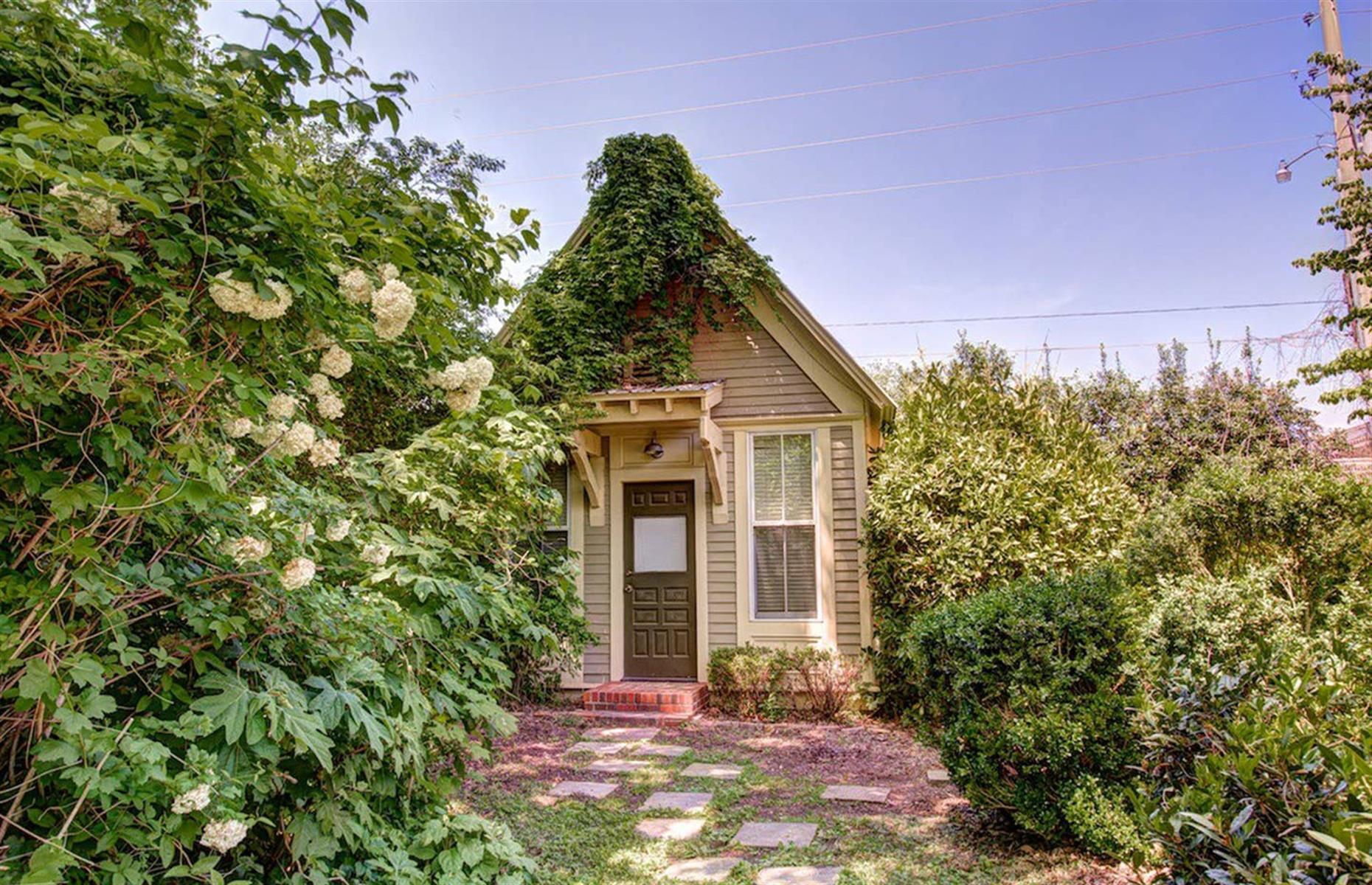 <p>Often named among the top Airbnbs in Alabama, <a href="https://www.airbnb.co.uk/rooms/1004344">this stunning cottage</a> also happens to be $105 a night. The 100-year-old hideaway, just around 15 miles (24km) from Huntsville, is located within the grounds of The Winchester Manor and has many charming details, like antique brick floors. There's plenty of history here too, as the cottage used to be a post office, then served as a doctor's office, and even functioned as a jail. The one-bedroom, open space has a breakfast nook and a kitchen area, as well as a bathroom with a tub and a hot tub outside.</p>