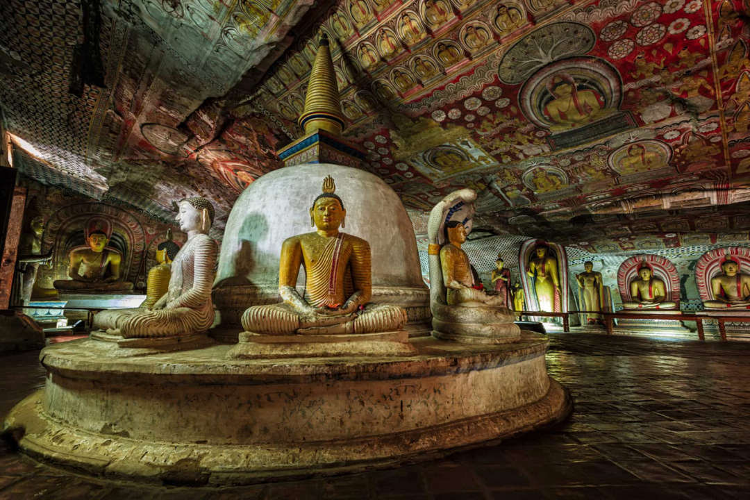 Slide 35 of 58: An island nation anchored off the south of India in the Indian Ocean. Dambulla, in the middle of the country, is celebrated for its cave temple complex (pictured).