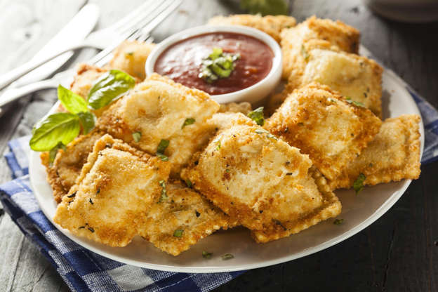 Slide 3 of 26: At about 20 cents per piece, frozen ravioli make a great inexpensive appetizer when fried in oil ($1) until golden brown and served hot. Because they are so rich, figure only one or two ($4 worth) for each guest.Related: The Best Fried Foods Around the World