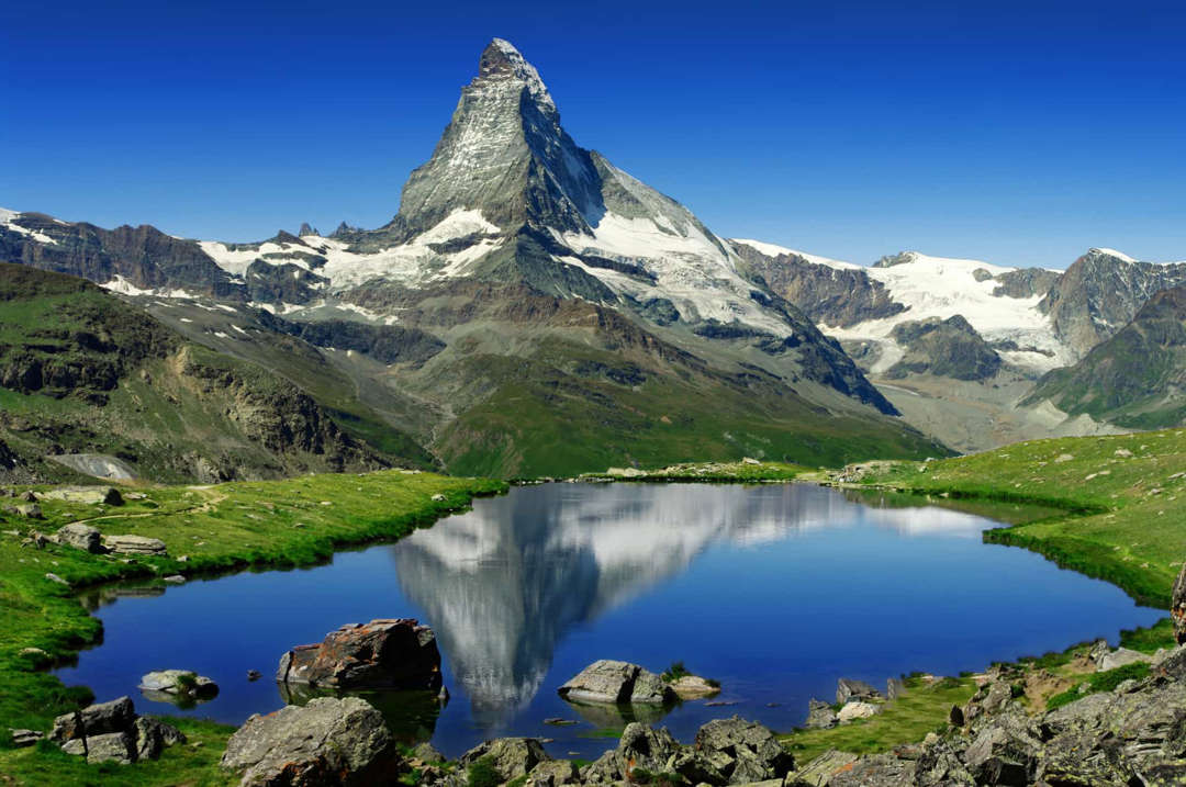 Slide 15 of 58: The Matterhorn, with its near-symmetrical pyramidal peak and 4,478 m (14,692&nbspft) summit, is one of the most recognized mountains in the world.