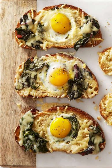 Slide 10 of 31: Amp-up the kid-friendly classic with earthy greens and nutty cheese. Now adults will love it too!Get the recipe for Chard and Gruyère Eggs in the Hole »
