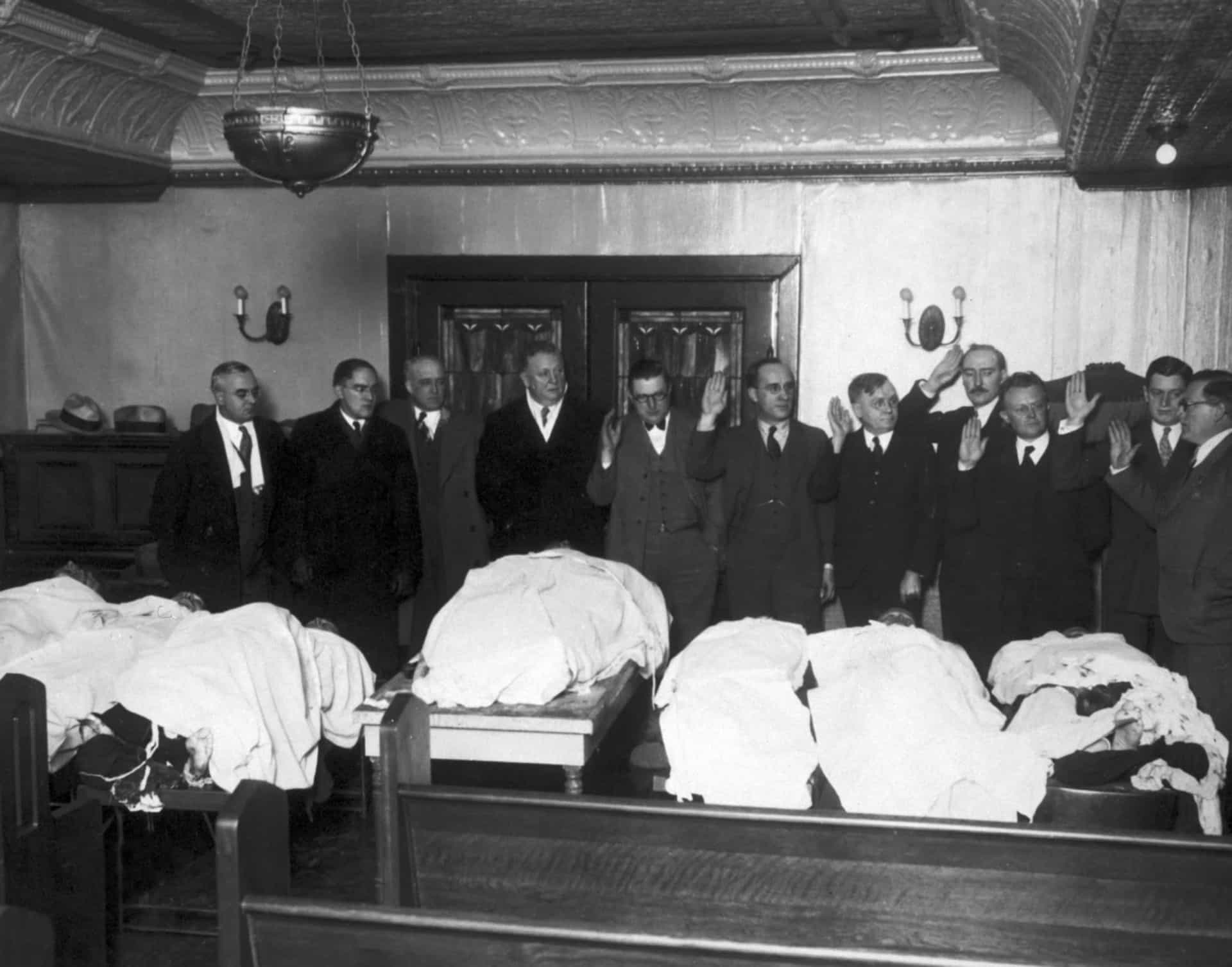<p>In the wake of the massacre, President Herbert Hoover was asked to intervene to stem Chicago's lawlessness. A special crime committee was sworn in over the bodies of the victims (pictured), which in turn spurred the creation of Eliot Ness' 'Untouchables' unit and spelled the beginning of the end for Capone.</p>