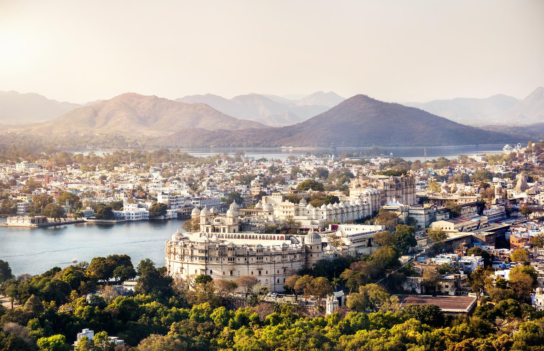 <p>Of all Rajasthan’s beautiful cities, Udaipur is perhaps the most heavenly. Known as the City of the Lakes, it looks almost as though it’s floating on the water, its lime-washed buildings light and dreamily delicate. Surrounded by sawtoothed peaks, this romantic city is a self-contained world full of palaces, forts and havelis (mansions built around courtyards). Its most iconic building is City Palace, Rajasthan’s largest royal complex, made up of 11 dazzling palaces overlooking Lake Pichola.</p>