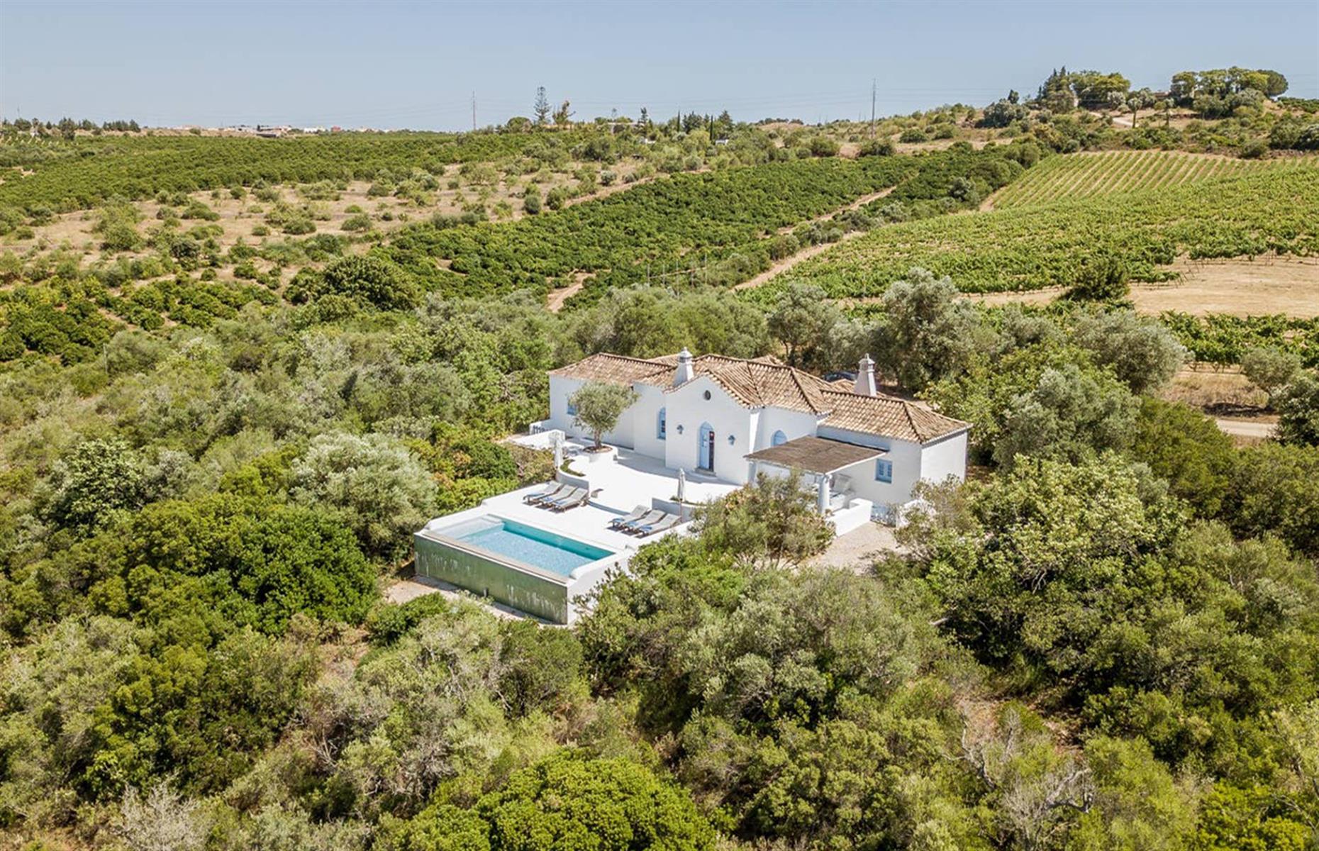<p>Surrounded by picturesque vineyards, <a href="https://www.airbnb.co.uk/rooms/18575757">Casa do Planalto</a> is a stunning three-bedroom villa that occupies one of Algarve's most stunning spots. Although it's in a rural setting, 38 miles (62km) from Faro, the villa has all the amenities of a modern home, from Wi-Fi and air-con to a TV and a fully-equipped kitchen. There's also an infinity pool looking out to the storybook countryside beyond. These are <a href="https://www.loveexploring.com/galleries/84953/the-worlds-most-remote-hotels">the world's most remote hotels</a>.</p>