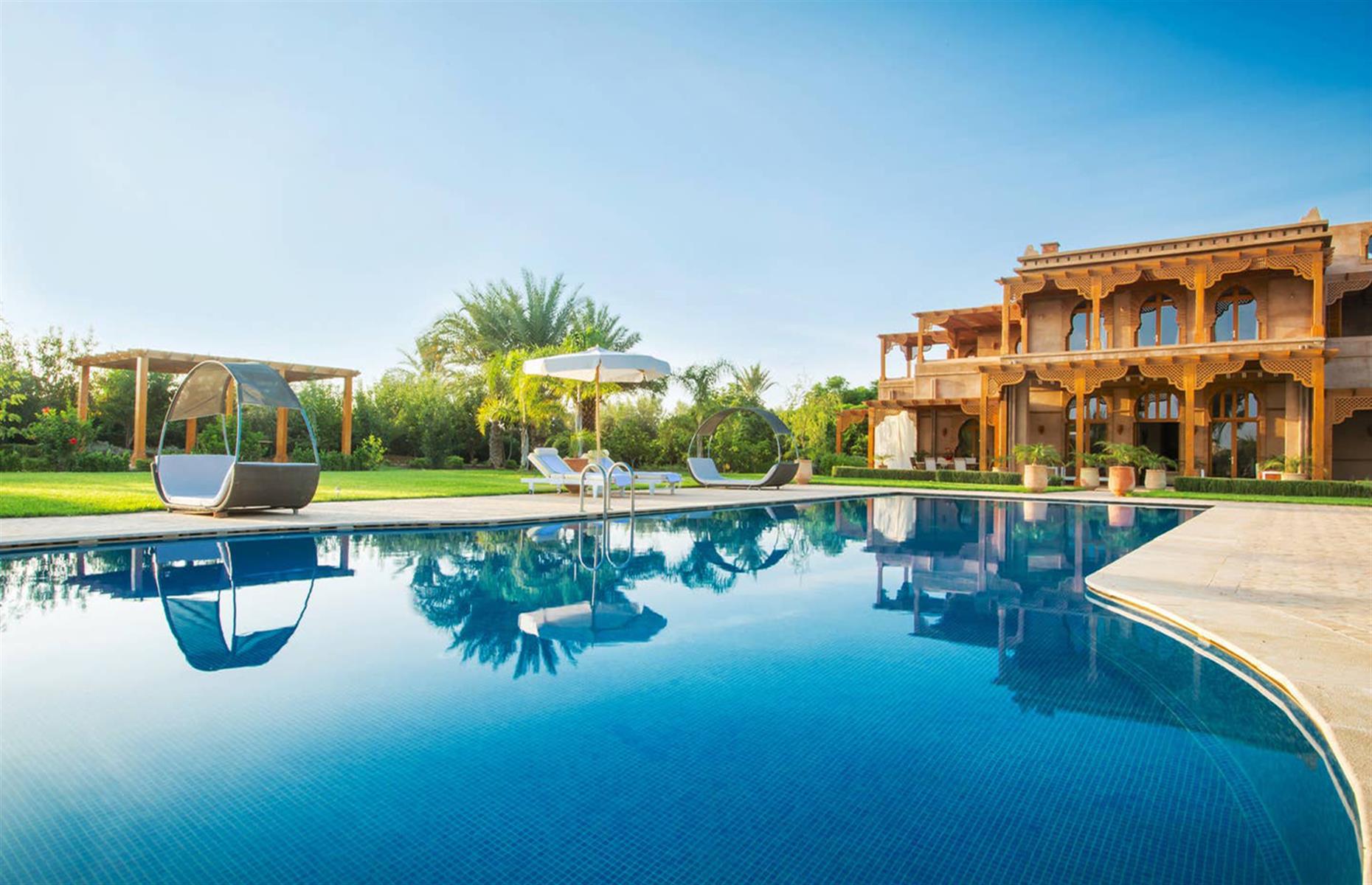 <p>Like something out of a real-life Arabian dream, <a href="https://www.airbnb.co.uk/rooms/7608507">this exquisite Moroccan villa</a> near Marrakech has five bedrooms and is beautifully decorated throughout with lots of North African and Arabic motifs. Built around a covered central riad-style courtyard, it's brilliant for escaping the hubbub of the city. There's also an opportunity to hire a private driver during the stay.</p>