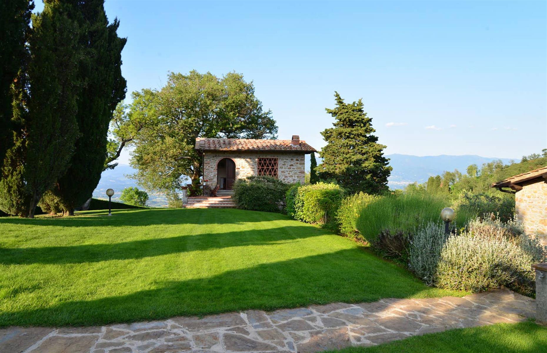<p>Located on picturesque farmhouse grounds in the Chianti hills, 12 miles (20km) from Florence, <a href="https://www.airbnb.co.uk/rooms/4081775">this quaint restored hayloft</a> has two bedrooms, a kitchen and a living area. Situated in a typical Tuscan agriturismo (B&B on a farm), this charming Airbnb is surrounded by cypress trees and offers sweeping views of the area. There's also a swimming pool and a private garden surrounded by towering oak trees.</p>