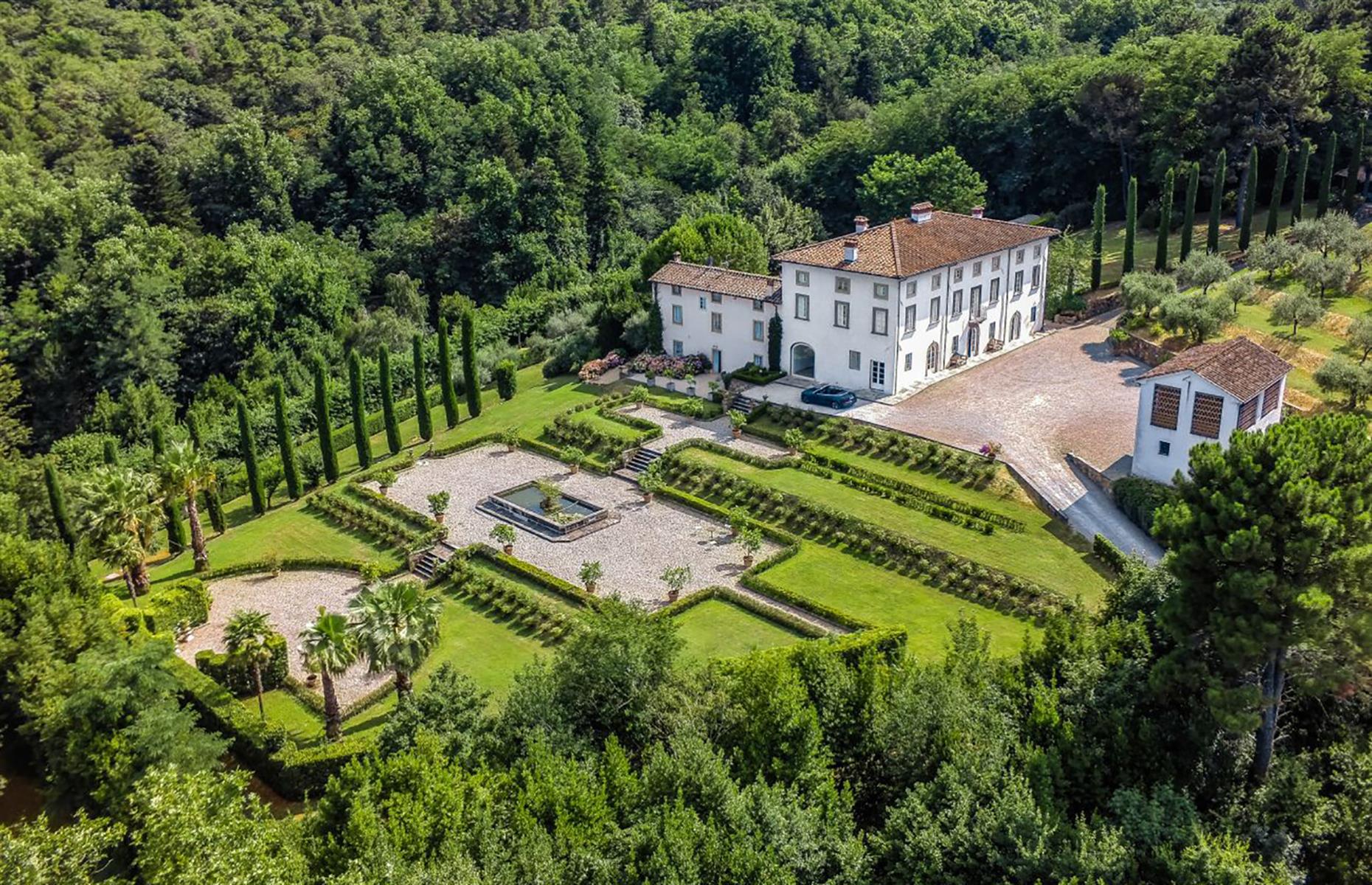 <p>Leaving <a href="https://www.airbnb.co.uk/luxury/listing/36111786">this delightful 15th-century estate</a> in Tuscany can't be easy. Set in 100 acres of woodlands, olive groves and vegetable gardens, the restored farmhouse is surrounded by palm trees, lush lawns and a terraced garden. Inside, state-of-the-art mod-cons sit comfortably with historic details.</p>