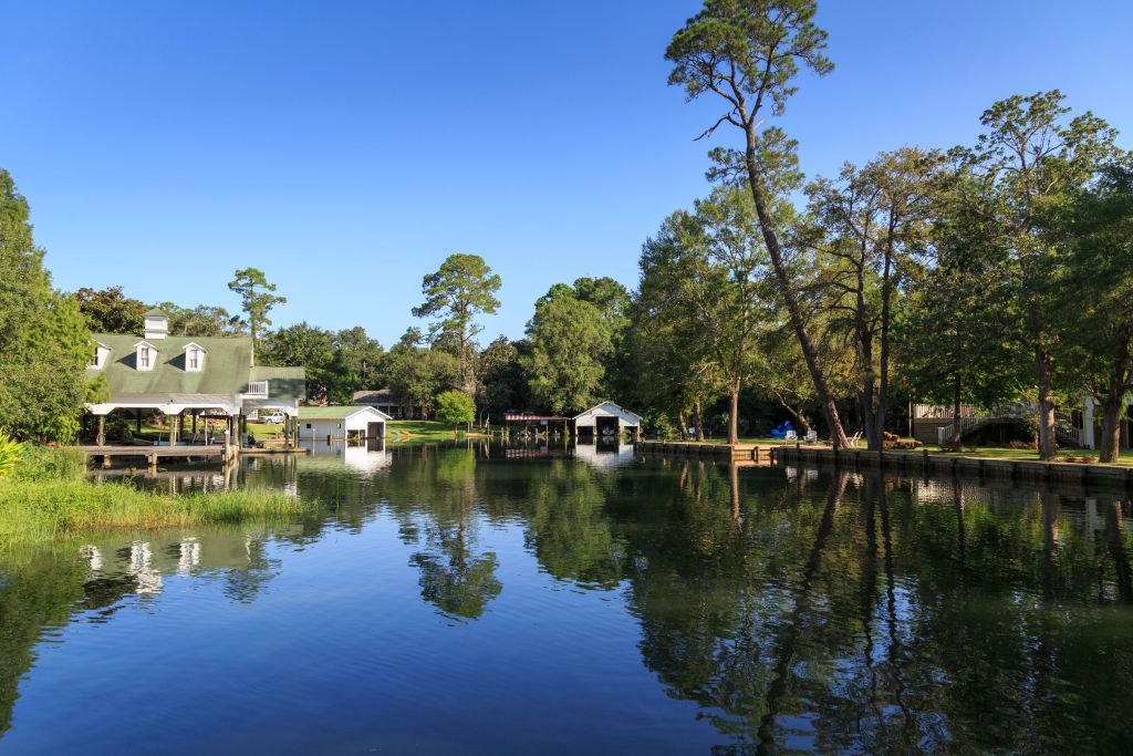<p><a href="https://www.townofmagnoliasprings.org/">Magnolia Springs</a> is the definition of a small town named after mature magnolia trees that create a beautiful canopy along the Magnolia River. The Southern town has a <a href="https://www.southernliving.com/travel/alabama/magnolia-springs-al">rich history</a> dating back to the 1800s, when it was a settlement for the Spanish.</p>