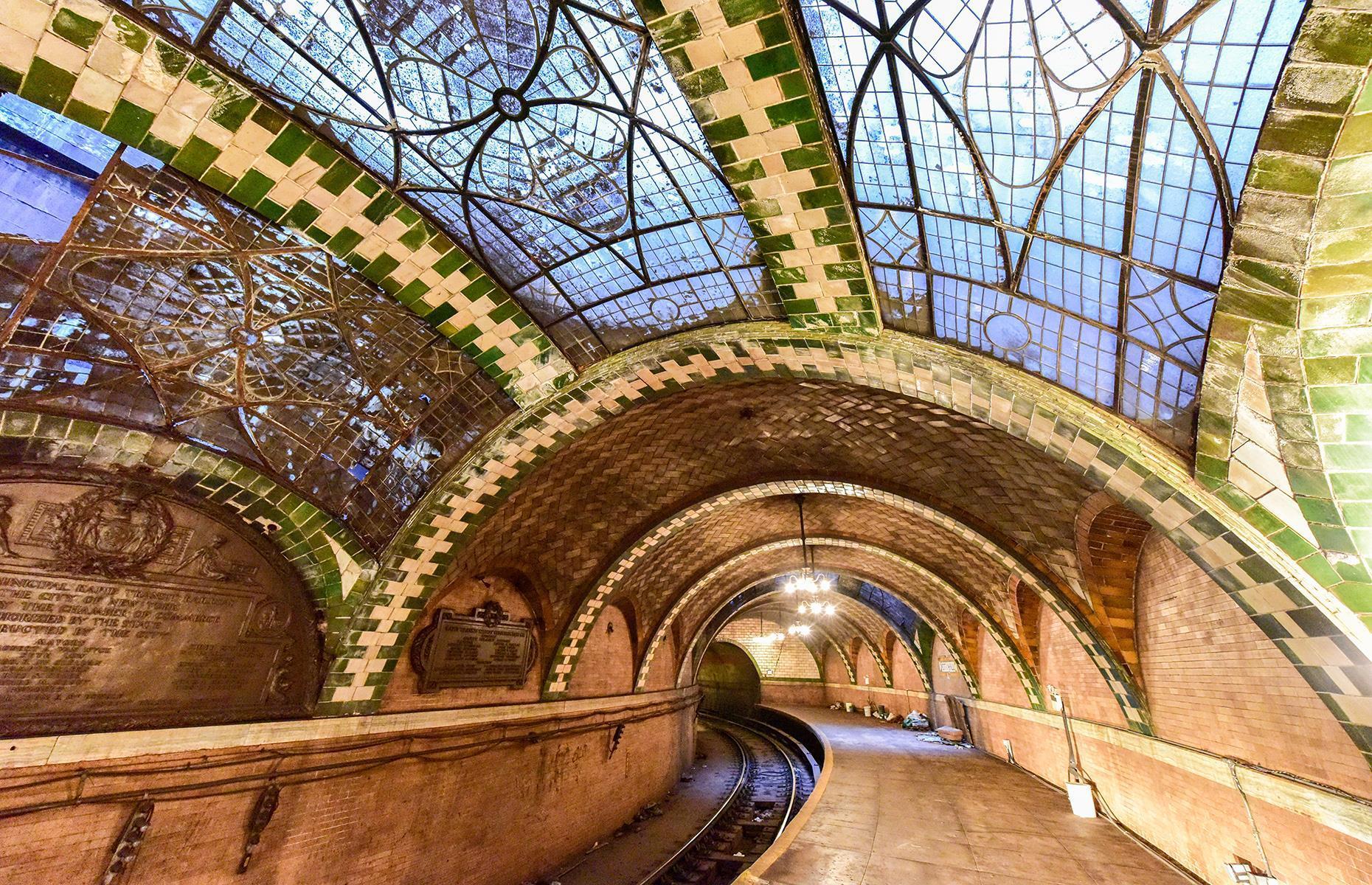 <p>Opened in 1904, beautiful City Hall is much more elaborate than today's subway stations, with its vaulted ceiling and patterned glass. But, despite its architectural beauty, the station wasn't quite fit for purpose. Its curved platform design meant that it couldn't accommodate the longer, modern trains that took to tracks in the 20th century. It was closed in 1945 and <a href="https://www.nytransitmuseum.org/oldcityhall/">the New York Transit Museum</a> typically run tours today – availability may be altered due to COVID-19. </p>
