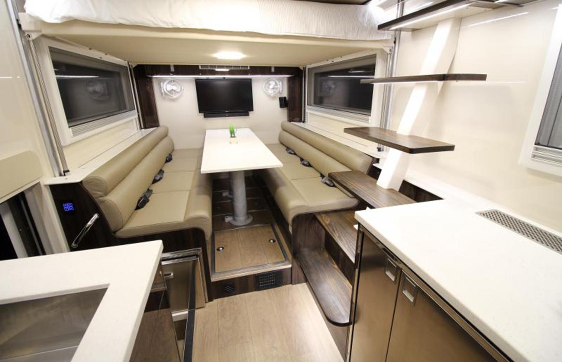 Not one to sacrifice style for substance, the bespoke motorhome also includes a master suite complete with a full bathroom. There's even the optional addition of a lift-up electric bed with a lounge space underneath – the perfect solution for guest accommodation.