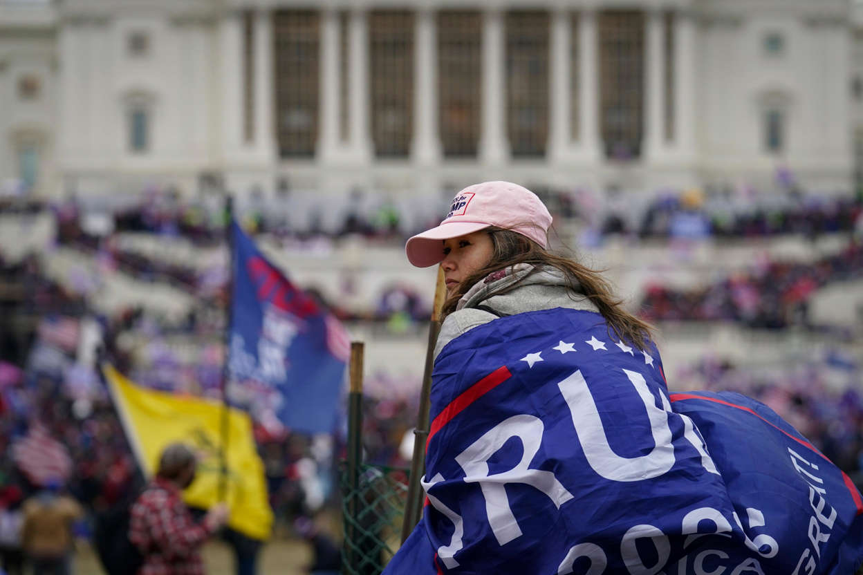 Slide 1 of 76: Trump supporters gather outside the Capitol, Wednesday, Jan. 6, 2021, in Washington. As Congress prepares to affirm President-elect Joe Biden's victory, thousands of people have gathered to show their support for President Donald Trump and his claims of election fraud.