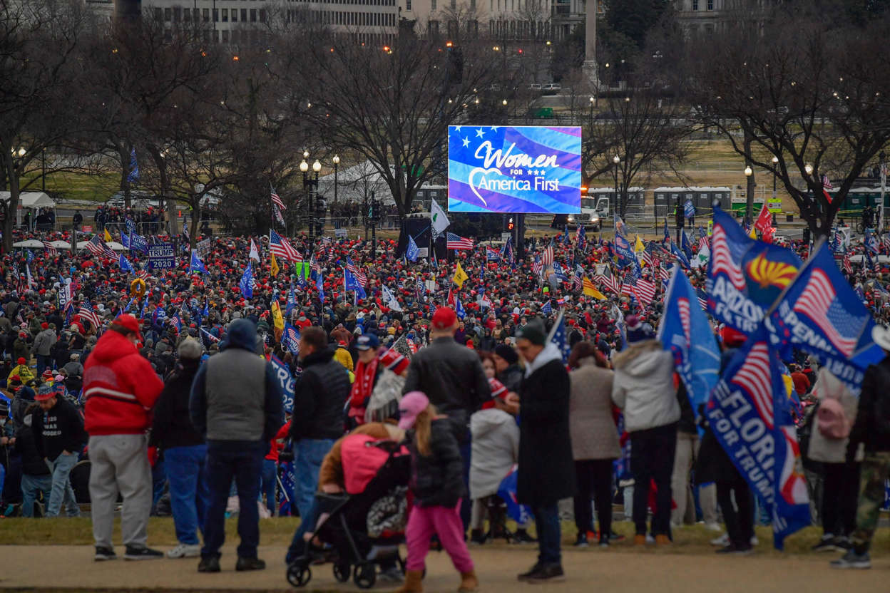 Slide 65 of 76: People line up near the Washington Monument waiting to get into a rally near the White House in Washington, DC on Jan. 6, 2021.