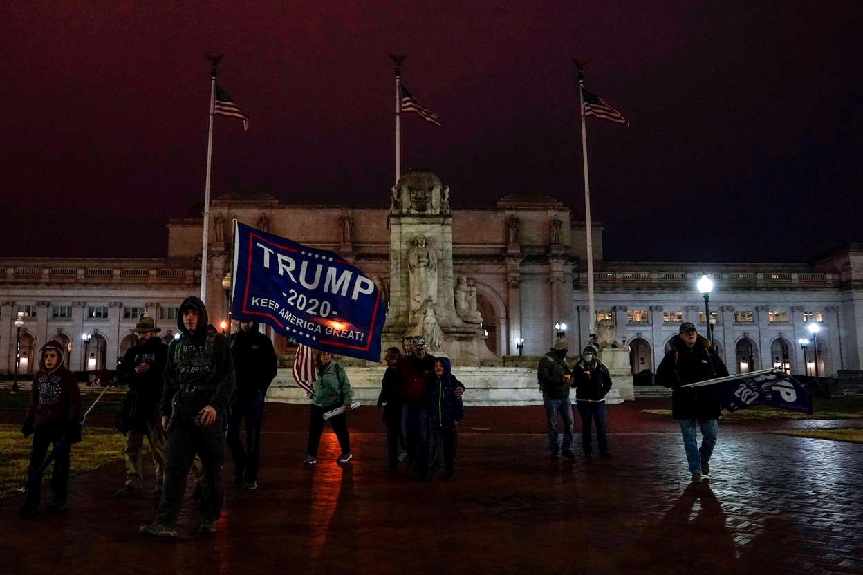 Slide 72 of 76: Demonstrators arrive for a rally in support of President Donald Trump in Washington, D.C. early on Jan. 6, 2021.