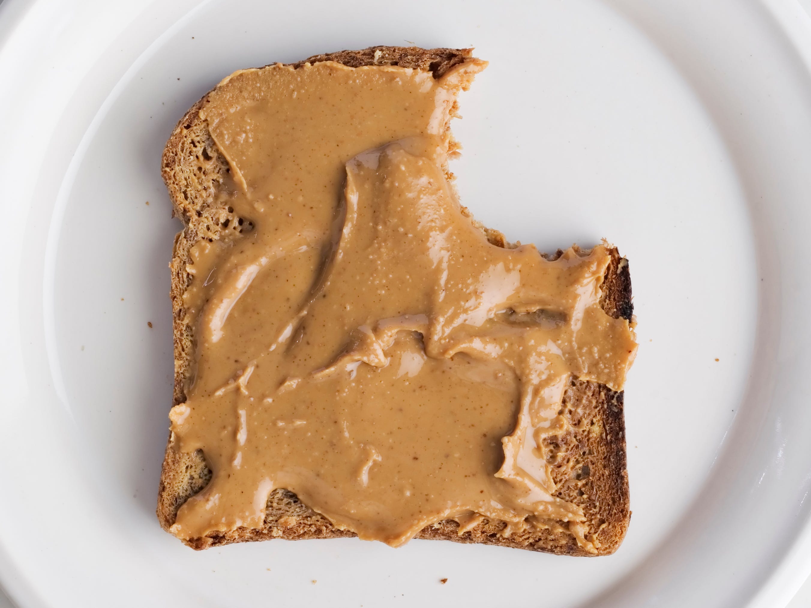 <p><a href="https://www.healthline.com/nutrition/is-peanut-butter-bad-for-you#TOC_TITLE_HDR_5">Peanut butter</a> is low in carbs, and it can be a great source of protein and "healthy" fats. </p><p>"My favorite high-protein food for weight loss is peanut butter," <a href="https://dietitianthyme.com/">registered dietitian nutritionist Rebecca Stib</a> told Insider. "Per a serving (which is typically 2 tablespoons), you'll get about <a href="https://fdc.nal.usda.gov/fdc-app.html#/food-details/1100559/nutrients">8 grams</a> of protein."</p>