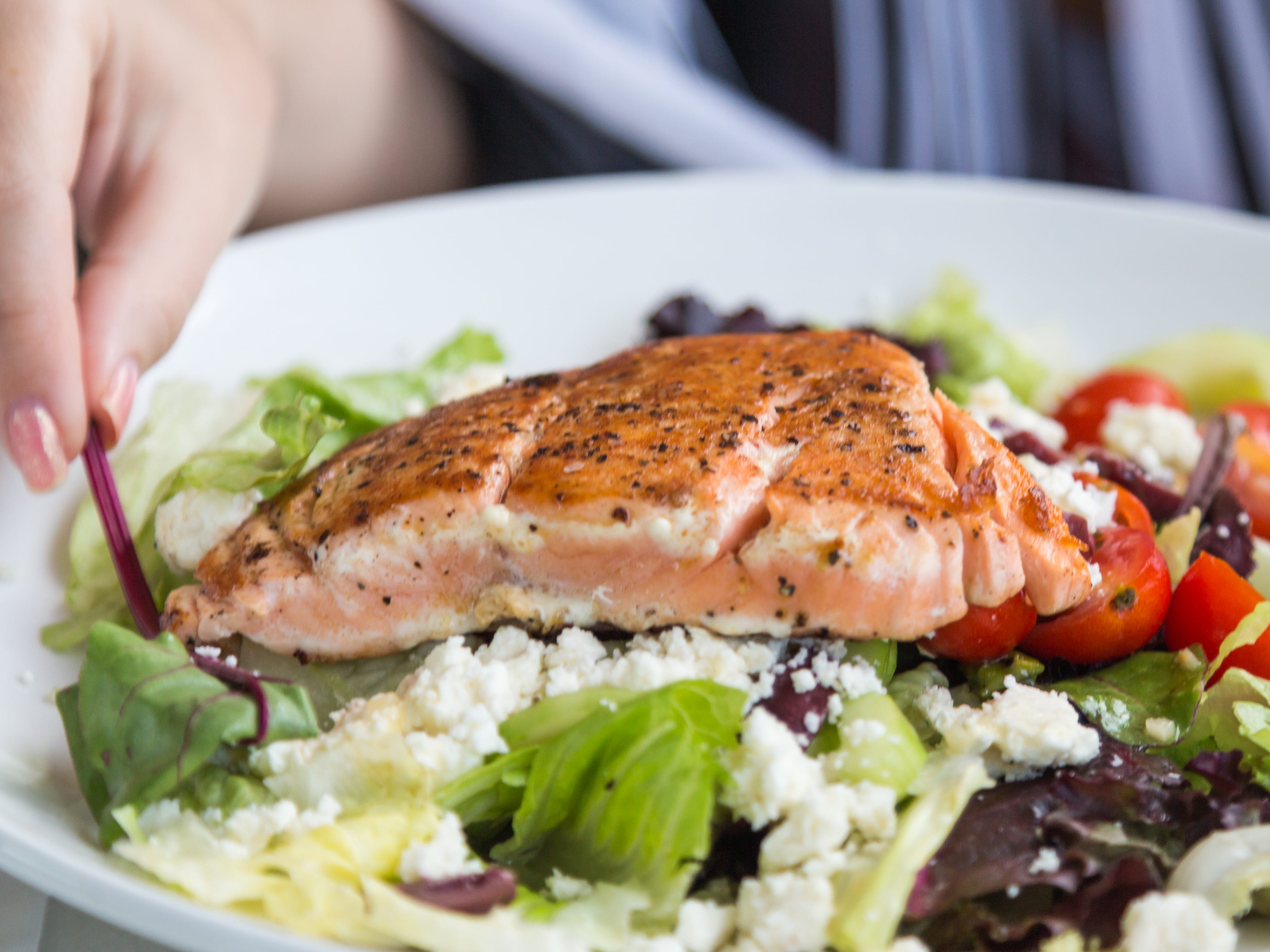 <p>"One of my absolute favorite foods for weight loss is salmon," Fillenworth told Insider.</p><p>Although <a href="https://www.insider.com/healthiest-fish-to-eat-expert-2019-7">salmon</a> is a fatty fish, she explained that eating the right kind of fat doesn't necessarily mean you're going to gain weight.</p><p>The fish contains <a href="https://www.healthline.com/nutrition/11-benefits-of-salmon#TOC_TITLE_HDR_2">essential omega-3 fatty acids</a>, which you have to get from your diet since the human body can't produce them.</p>