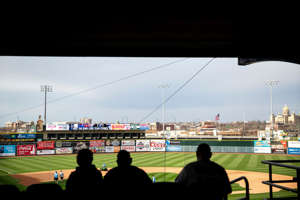 Baseball fans wait in the stands for the start of the Iowa Cubs' home opener against the New Orleans Baby Cakes on Tuesday, April 9, 2019, at Principal Park in Des Moines.