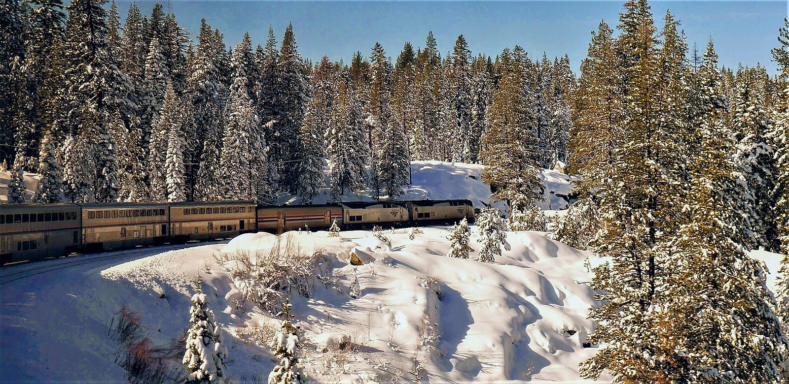 <p>If cross-country train trips are your thing, add the California Zephyr ride to your bucket list. This train journey, operated by Amtrak, runs from Chicago, Illinois, to Emeryville (San Francisco), California, and takes more than 50 hours to complete.</p><p>The itinerary also includes stops along the way in Iowa, Nebraska, Colorado, Utah, and Nevada. It’s possible to create a customized itinerary for part of the journey, like jumping on in Denver, Colorado, and getting off in Reno, Nevada.</p><p>Many of the scenic highlights include mountain ranges like the Rocky Mountains and Sierra Nevadas. Near the end of your journey you’ll also be able to see the San Pablo Bay and Carquinez Strait.</p>