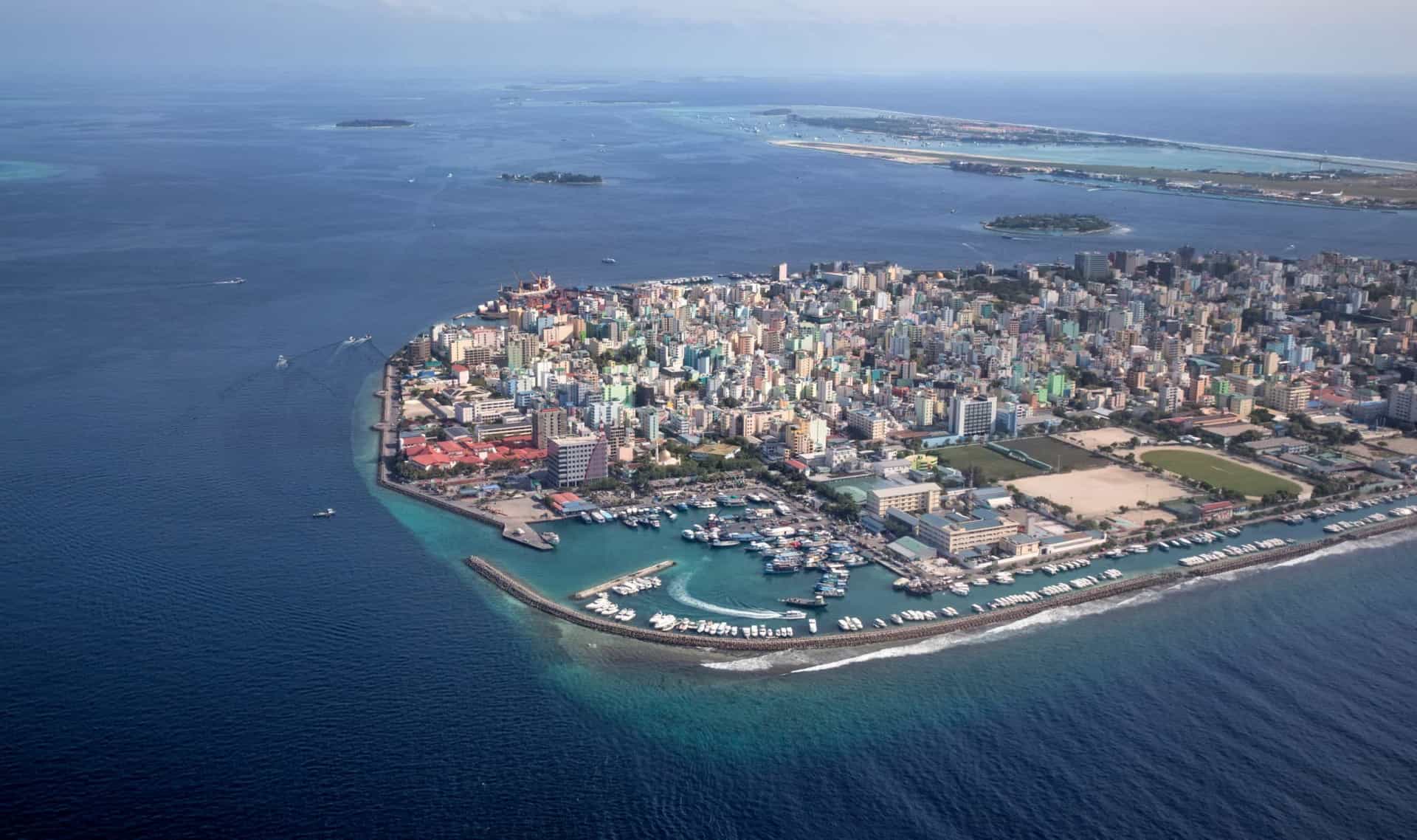 <p>The capital city is a sight to behold not in terms of beauty, but because of the ingeniousness with which they have constructed a city on a sand island. When you fly into the Maldives, you will almost certainly land here. It's worth taking a peek around.</p>