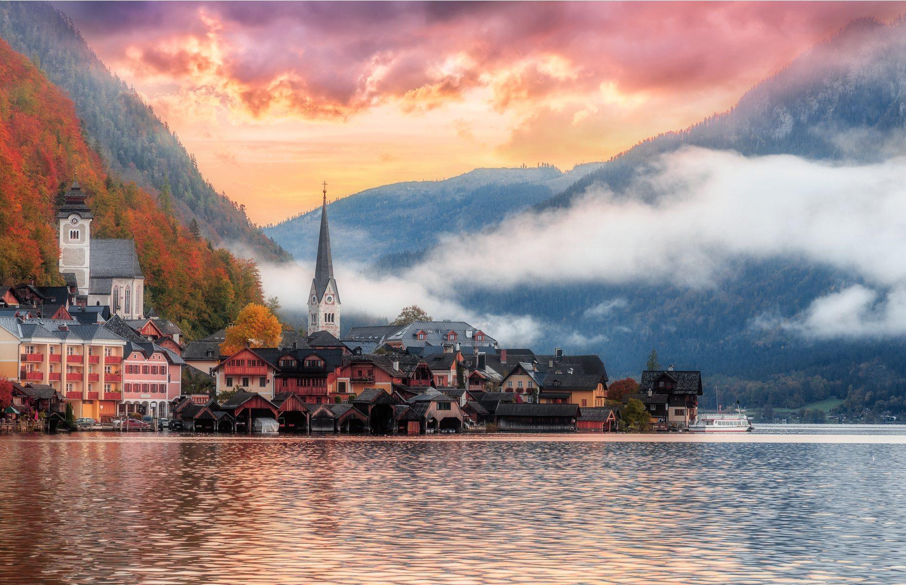 Looking postcard-perfect in this sunset shot, Hallstatt’s cluster of pastel-colored buildings are hugged by peaks and encircled by low-lying clouds. Located in the mountainous Salzkammergut region, Hallstatt’s long history began with the discovery of salt mines in the region in prehistoric times – possibly as early as 4000 BC. Today, much of the architecture dates back to the 16th century, with the buildings painted in an array of ice-cream hues.