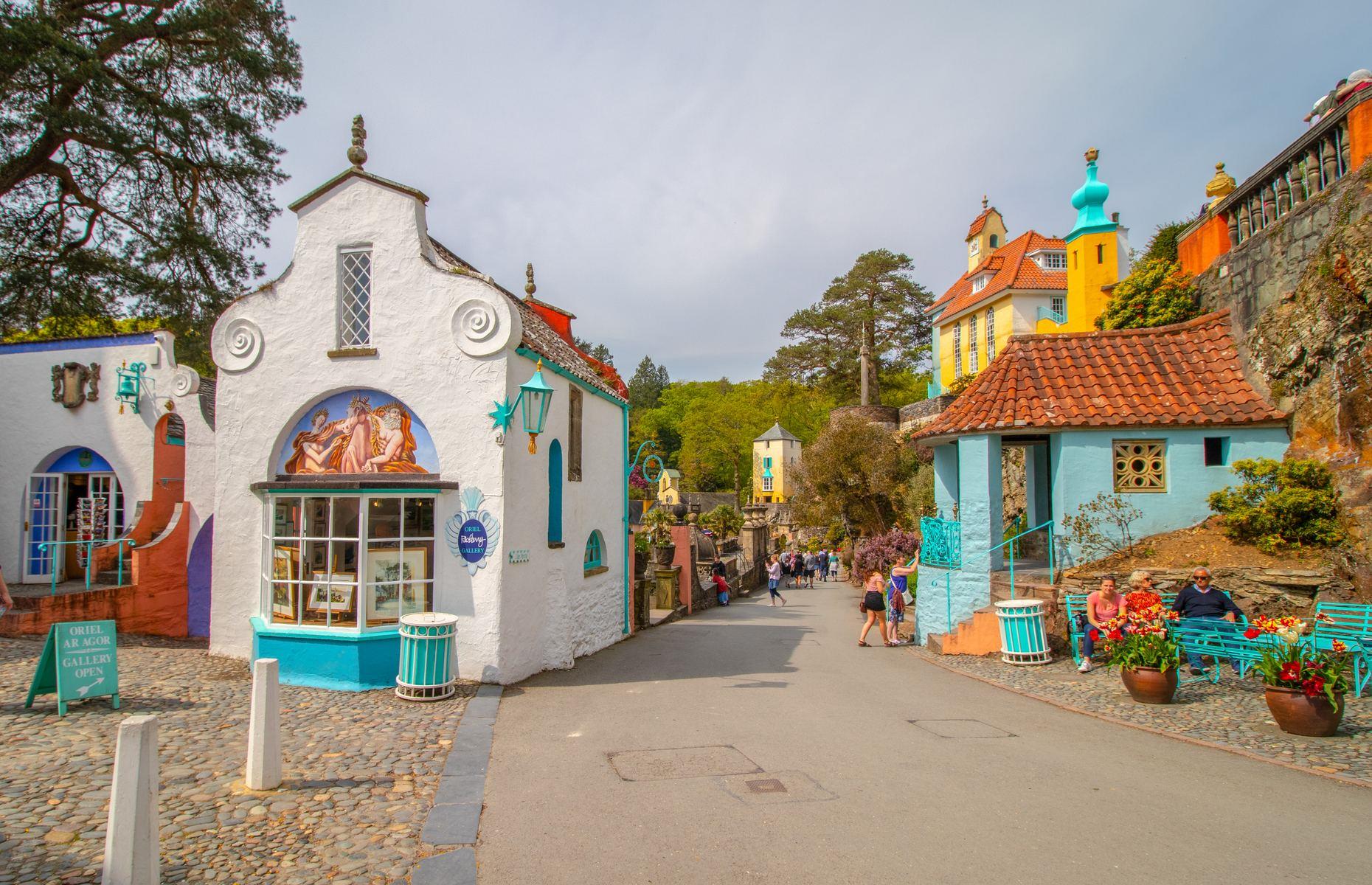 <p>While some villages were built to be functioning communities, <a href="https://www.loveexploring.com/news/68574/portmeirion-village-wales">Portmeirion was created as a fairy-tale folly</a>. Built by the Welsh architect Clough Williams-Ellis between 1925 and 1976 the colorful, Portofino-inspired buildings are gathered among exotic gardens and sandy beaches, punctuated by quaint cafés, restaurants and even an Italian ice cream parlor. The area's steam train still trundles along one of the oldest tracks of its kind.</p>