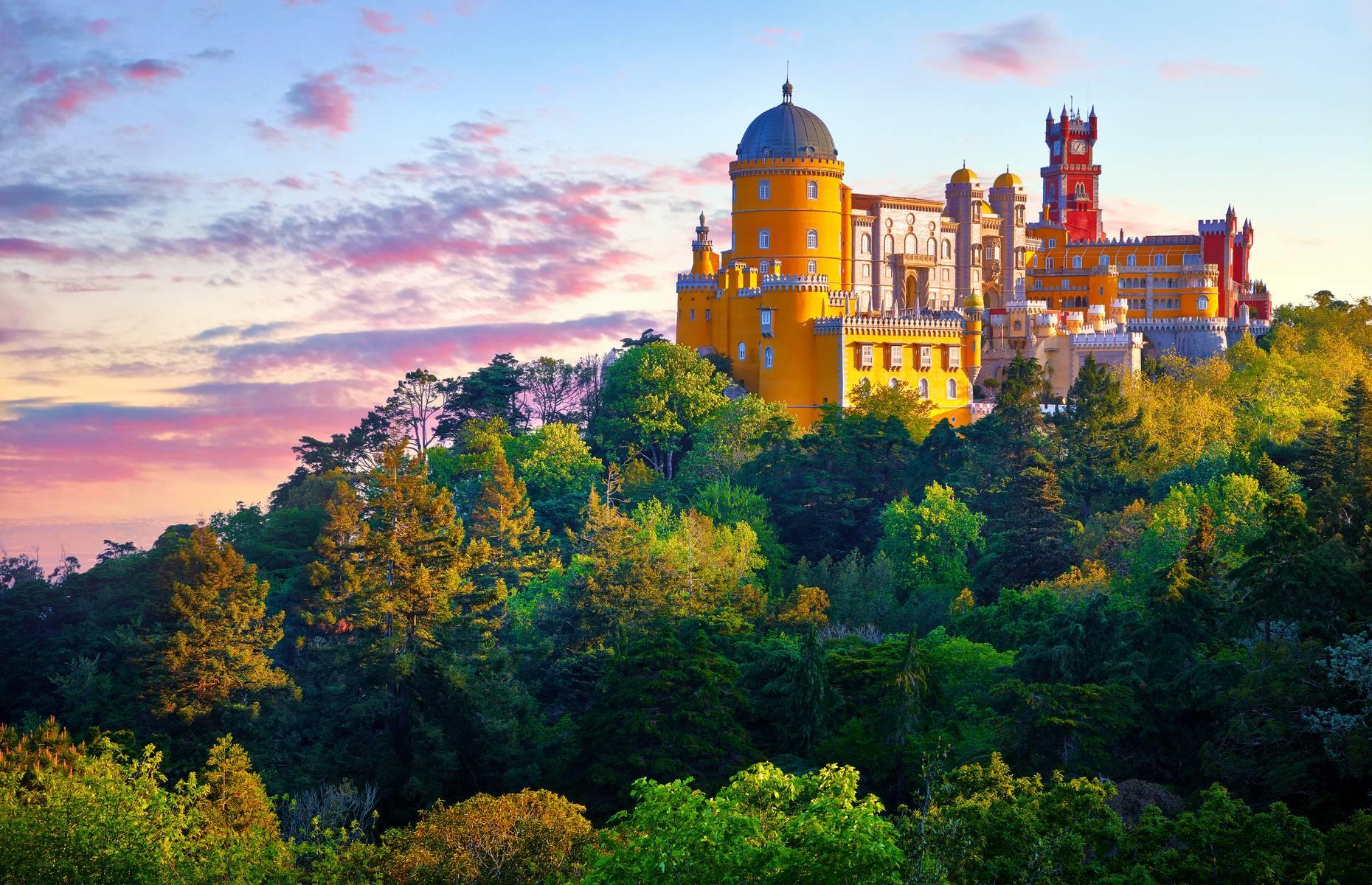 The jewel in Sintra’s crown is Pena Palace, the whimsical 19th-century castle which stands watch over the settlement. Located on the northern slope of the picturesque Sintra mountains, the town was formerly used as a royal summer residence. Today, it's best known for its historic palaces, 18th-century gardens and picturesque surroundings.