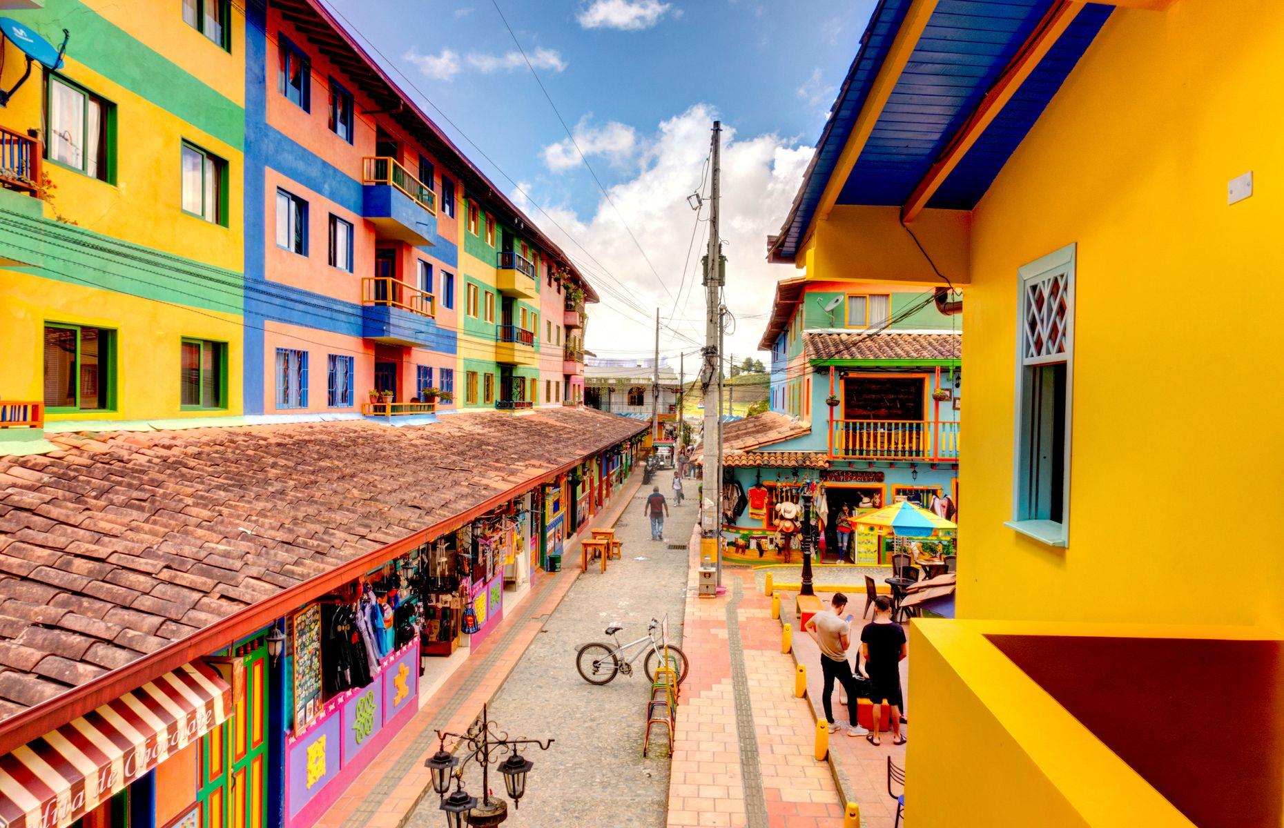 <p>Painted in a rainbow of vibrant hues, the Colombian town of Guatapé is as colorful as they come. The most iconic feature of this curious place are its zócalos – colorful panels that line the bottom of buildings – a tradition that started here around a century ago. Today, they are a vibrant depiction of village life, with some panels telling stories and others advertising local businesses.</p>  <p><strong><a href="https://www.loveexploring.com/galleries/49689/the-worlds-most-colourful-destinations?page=1">See more colorful destinations around the world</a></strong></p>