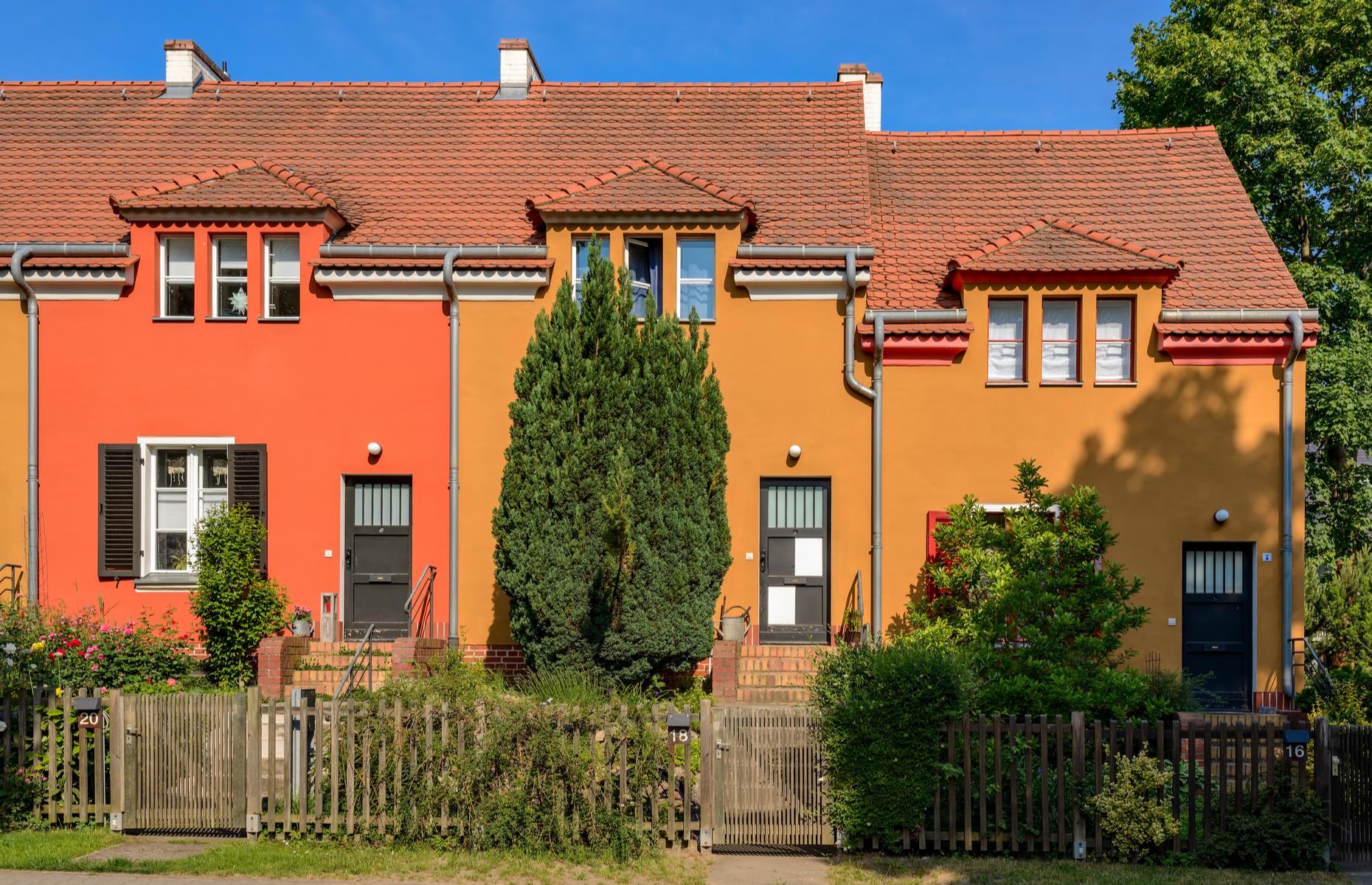 <p>These warm-hued homes are among six Modernism housing estates in Berlin that have been listed as <a href="http://whc.unesco.org/en/list/1239">UNESCO World Heritage Sites</a>. These were bold, colorful examples of a new attitude to social housing, with cheery hues, clever use of space and lots of natural light creating a striking contrast to the dark, cramped flats that were previously the norm. Gartenstadt Falkenberg was the first to be constructed, built by Bruno Taut from 1913-15. Building styles changed under Nazi rule from 1933, though most of these bright and beautiful buildings survived.</p>