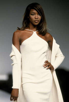 Slide 6 of 30: Naomi Campbell was discovered at the age of 15 and became one of the models responsible for the term "supermodel" being created. She was the first Black woman to appear on the covers of Vogue in Britain, France, and the US.