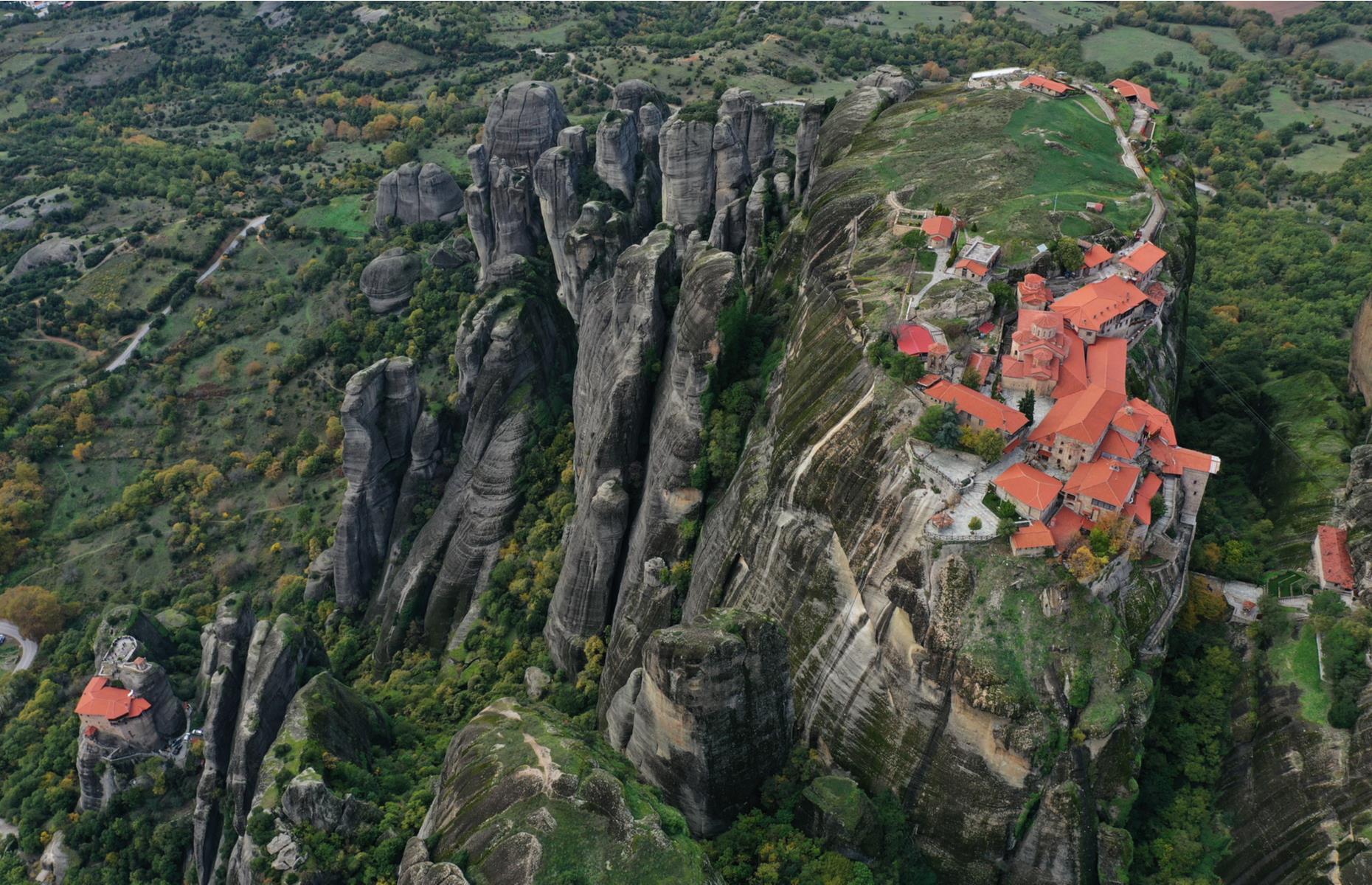 Perched on top of vertiginous sandstone pillars and boulders, the six Eastern Orthodox monasteries found in the plains of Thessaly, northwest of Kalabaka, have inspired visitors for centuries. In this awe-inspiring photograph, the monasteries’ precarious position and the cliffs’ impressive geology are enhanced by a drone’s-eye view.